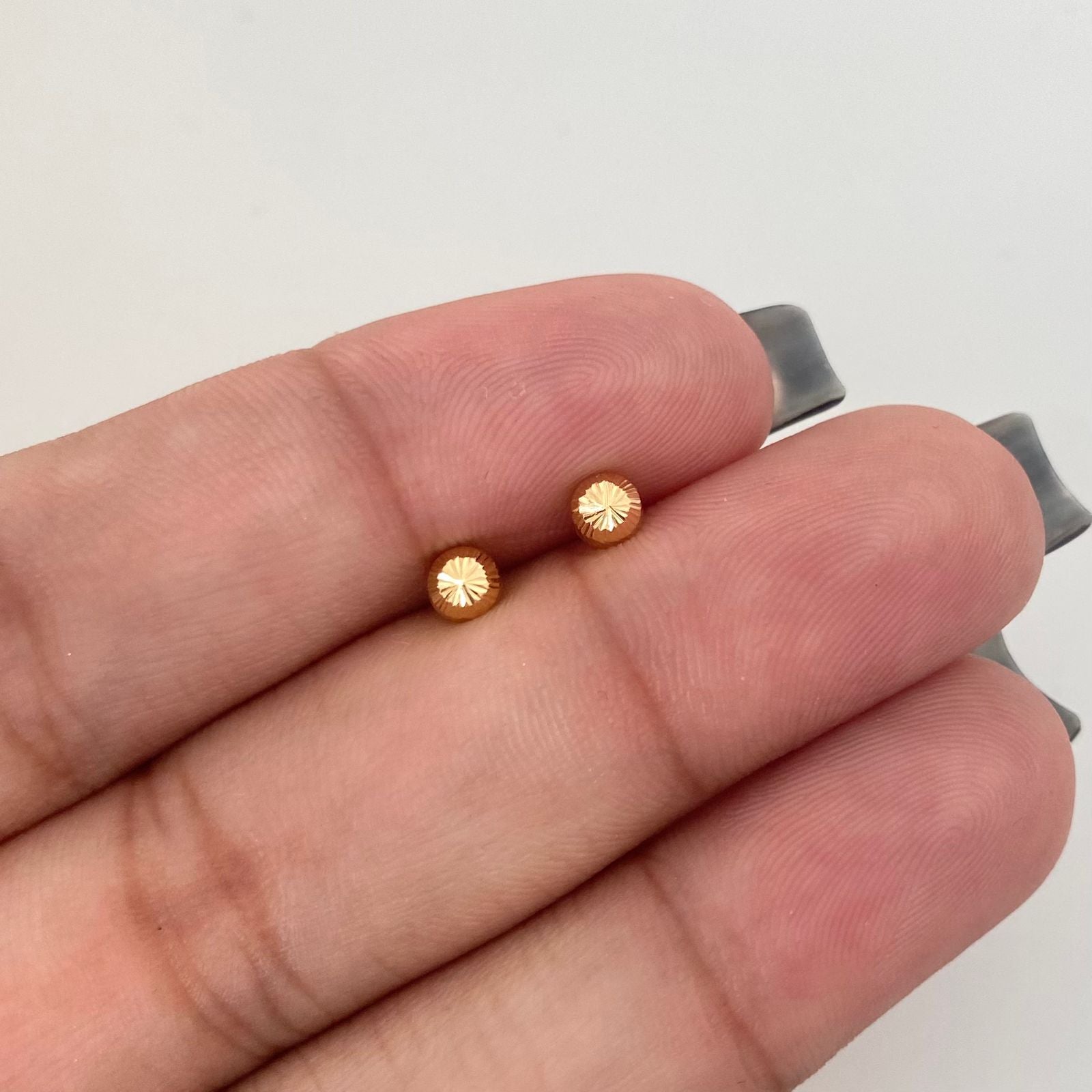 Topos bola diamantada Oro amarillo 18k 0,55 Gr / 4,0 mm