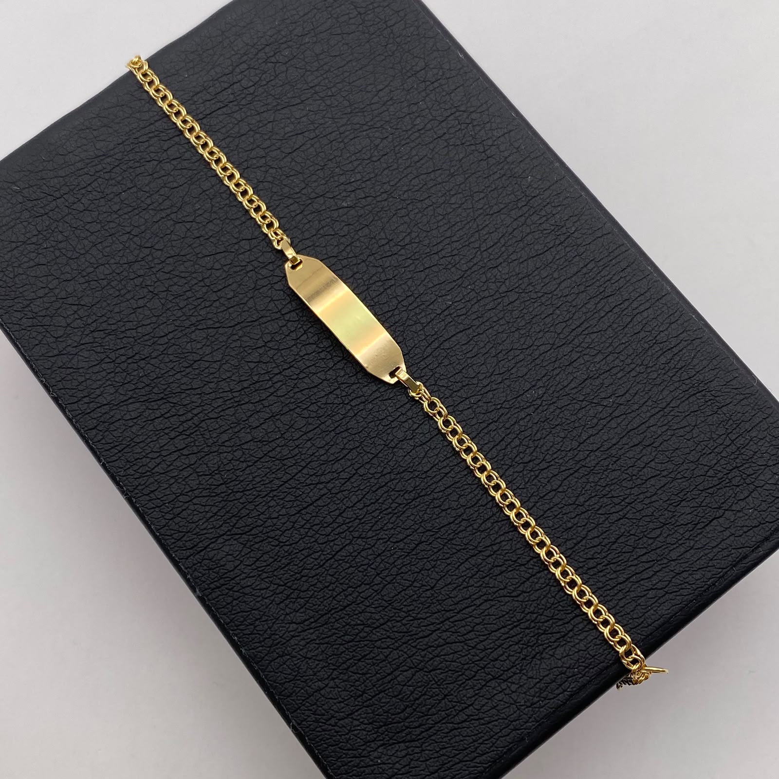 Pulso bebé placa aro seguido  Oro amarillo 1,40 Gr / 15 Cm  Broche 0,15