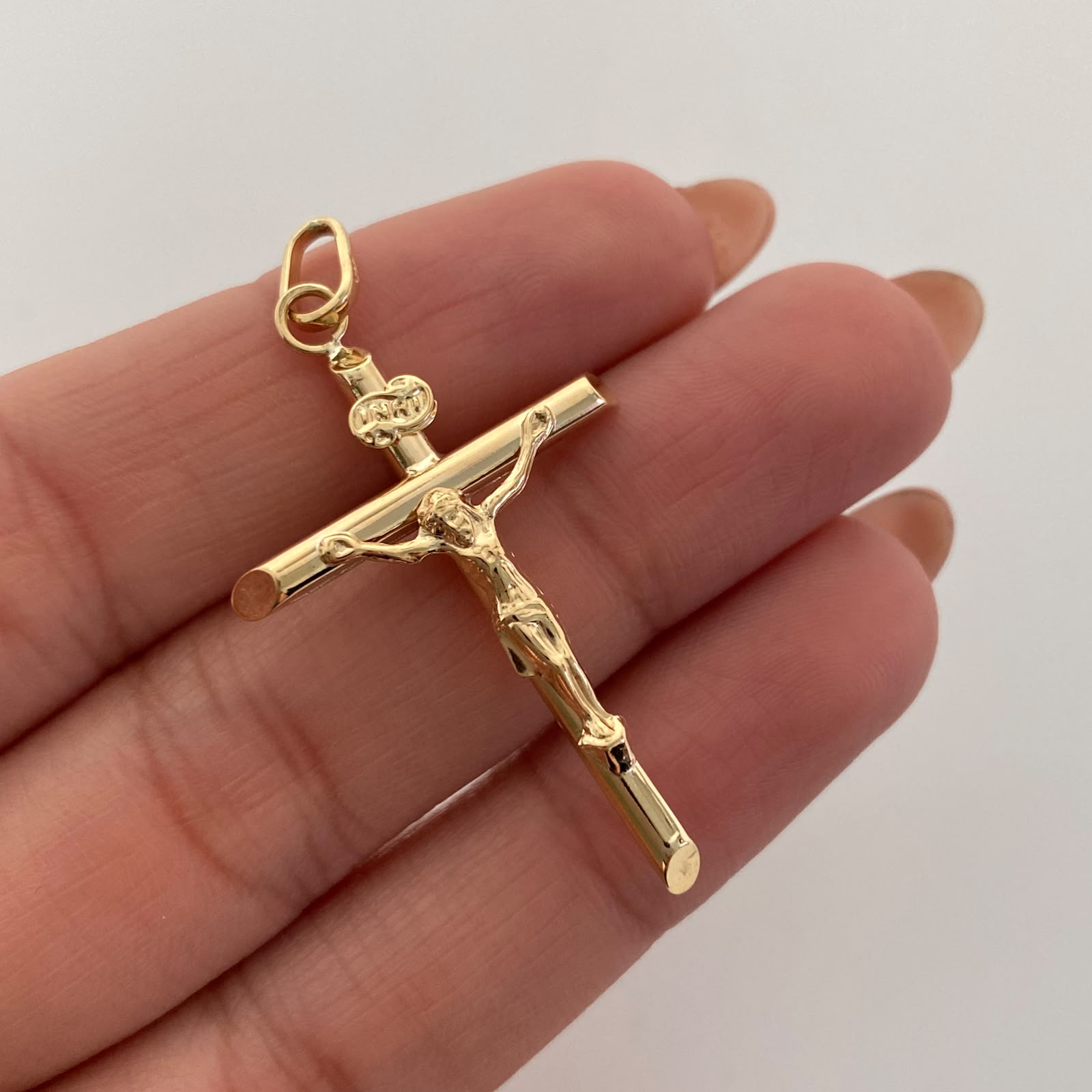 Dije Cruz Tubular Cristo Oro amarillo 18k 1,6 Gr / 24,6 mm / 4,4 Cm