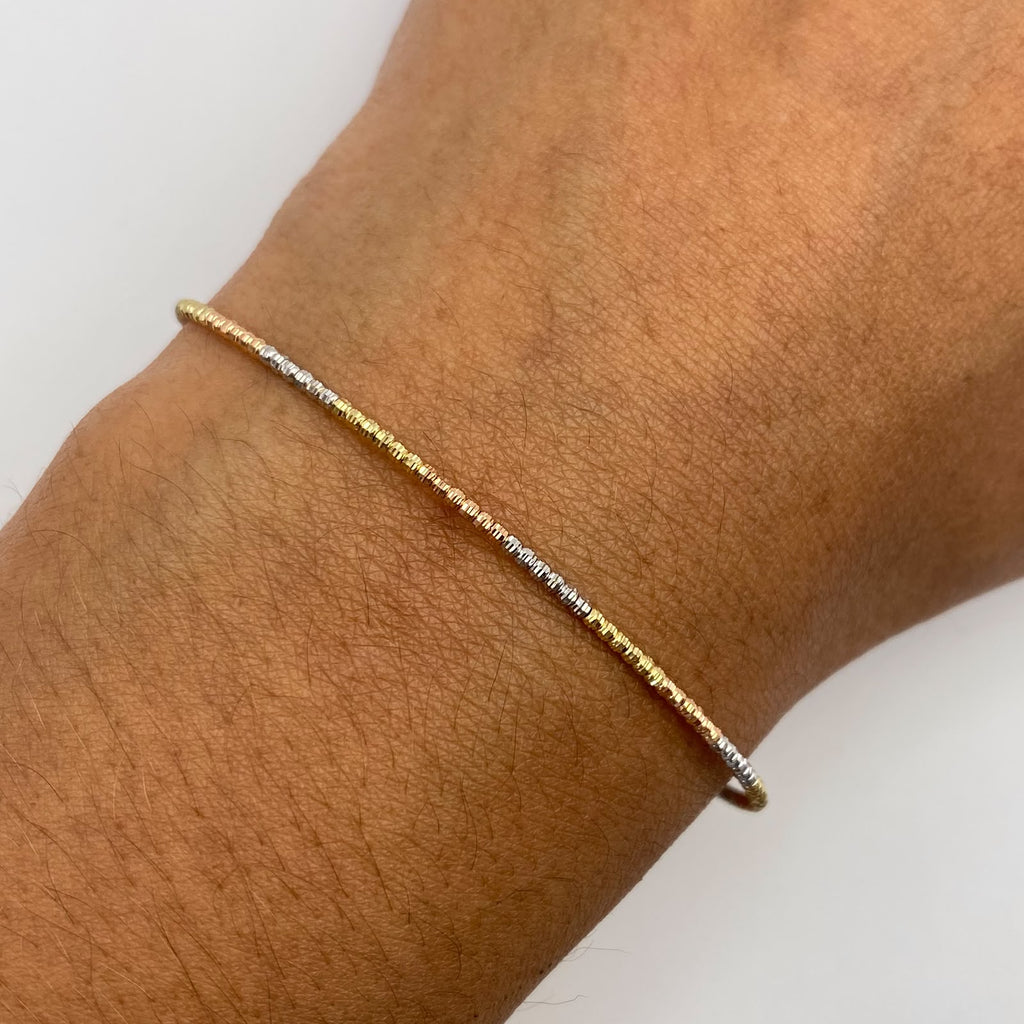 Aro It diamantado Tres oros 18k 2,09 Gr / 1,4 mm / 17,5 Cm