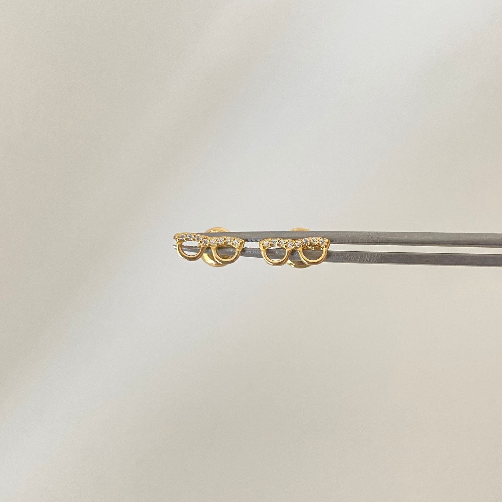 Topos silueta gafas circones Oro amarillo 18k 0,65 Gr / 9,0 mm