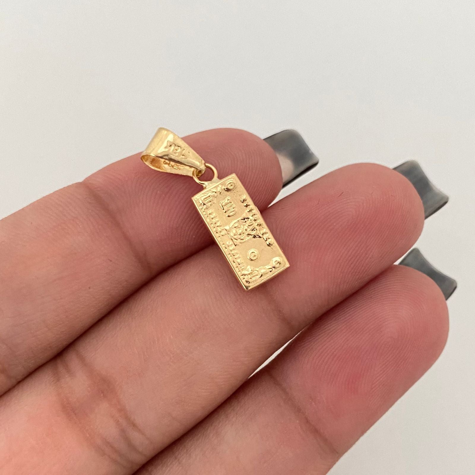 Dije dolar Oro amarillo 18k 0,7 Gr / 2,2 Cm