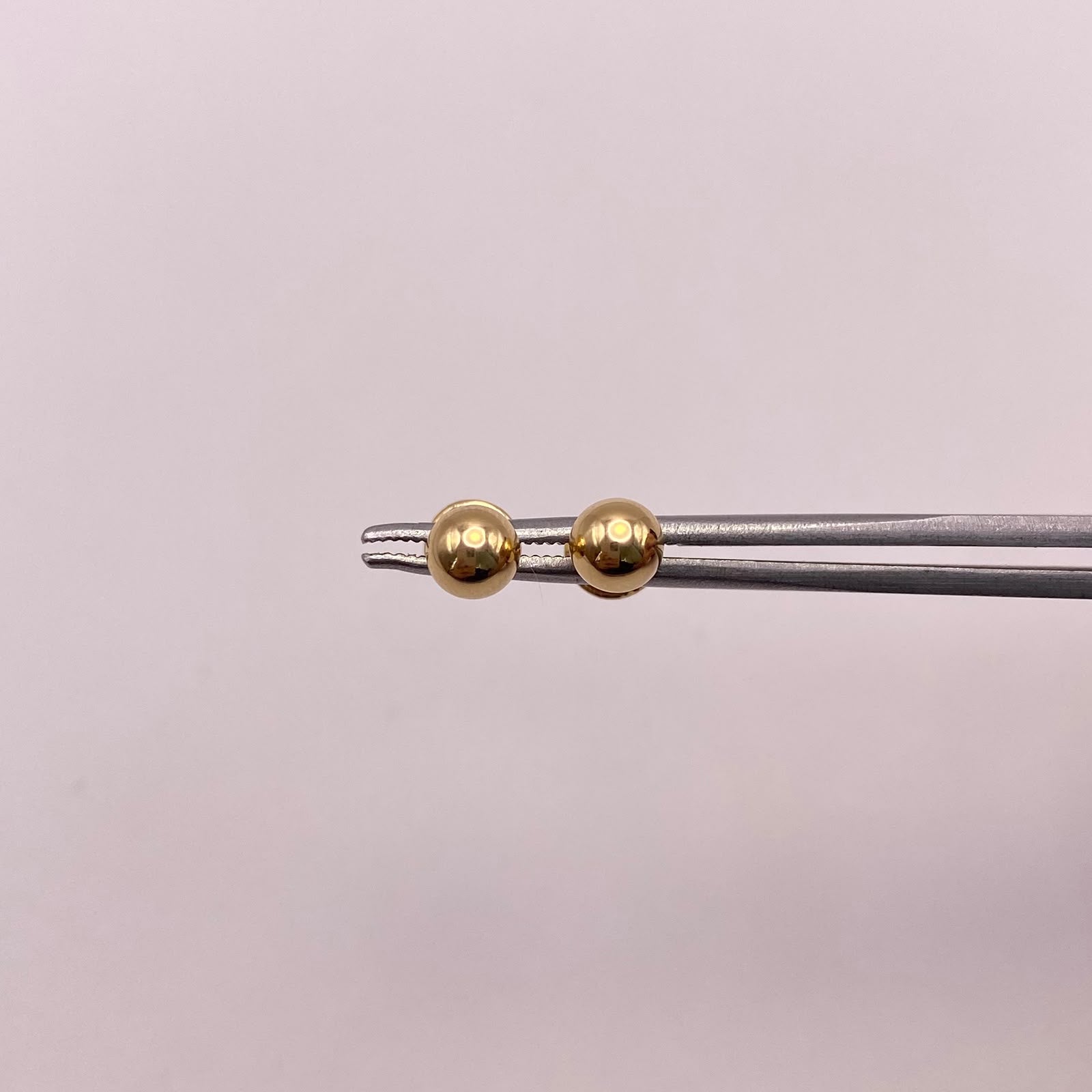Topos bola lisa 5mm Oro amarillo 18k 0,55 Gr