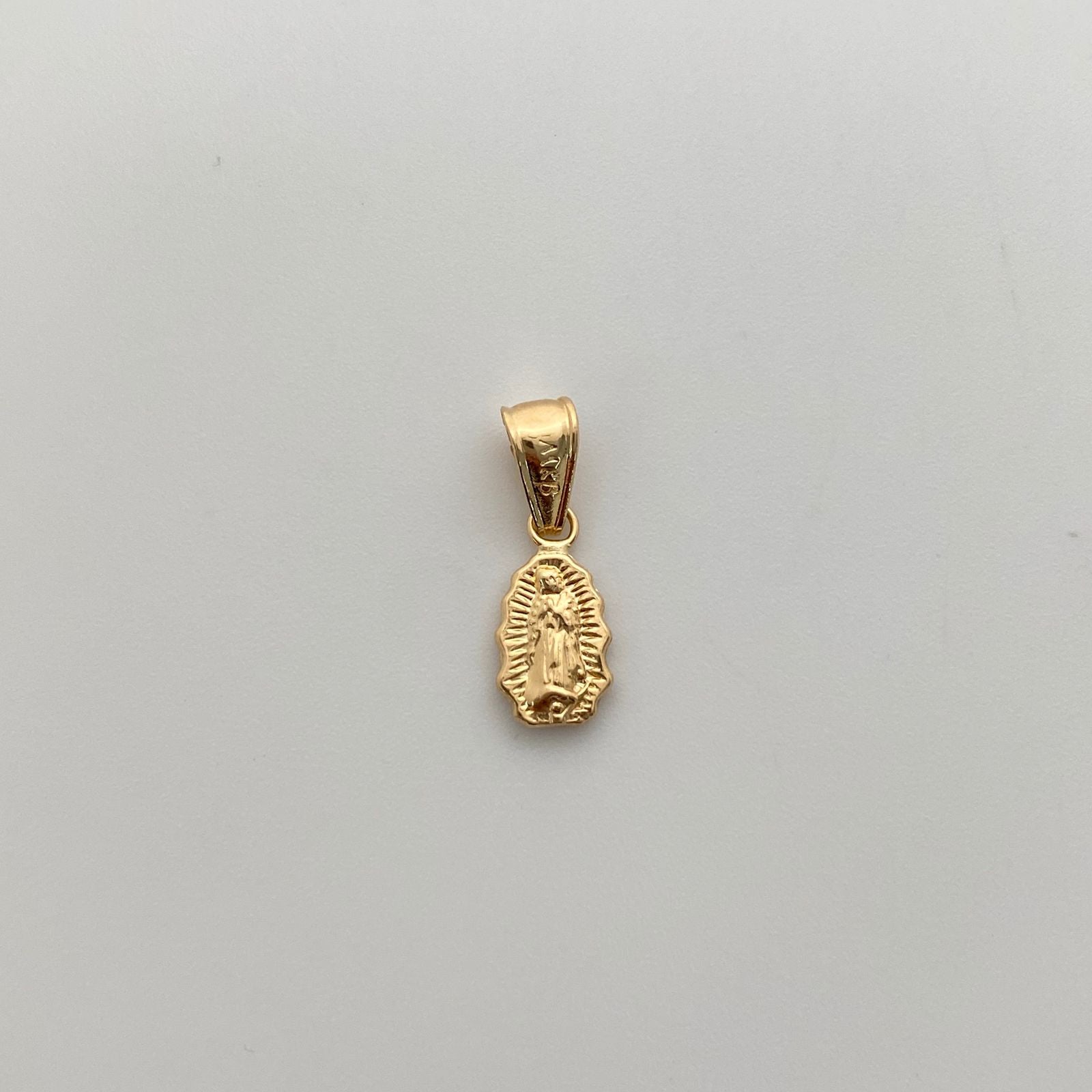 Dije Virgen de Guadalupe Oro amarillo 18k 0,5 Gr / 6,6 mm / 1,8 Cm