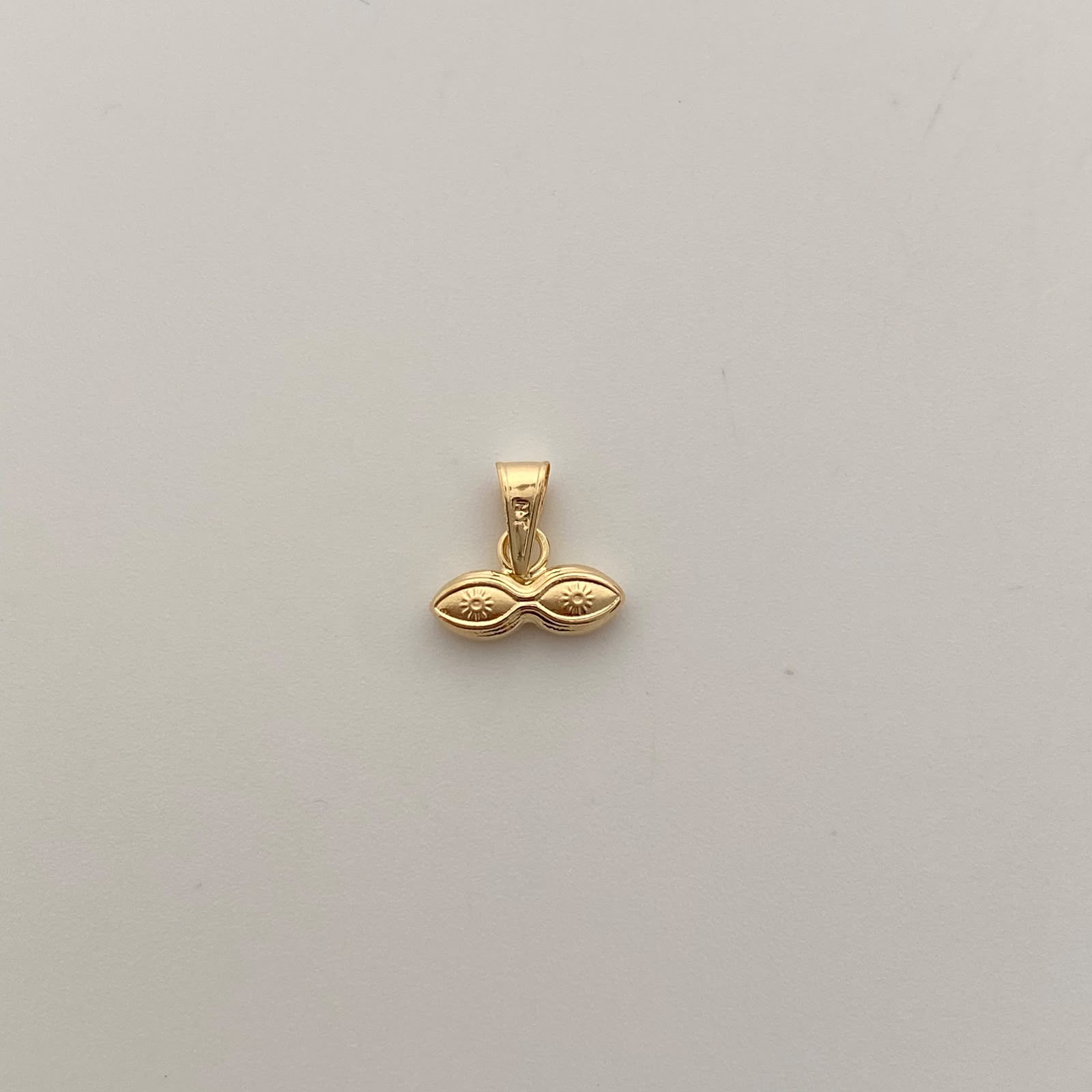 Dije Ojos de Santa Lucía Oro amarillo 18k 0,3 Gr / 10,8 mm / 1 Cm