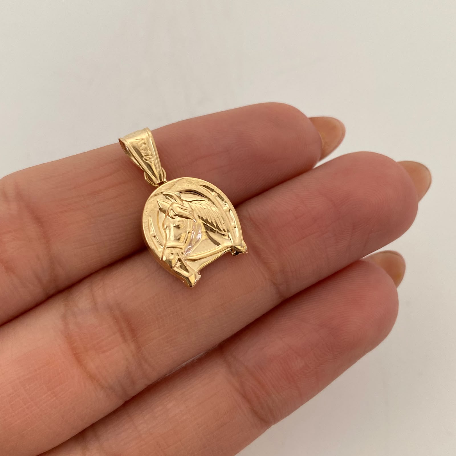 Dije Herradura de Caballo Oro amarillo 18k 0,95 Gr / 12,6 mm / 2,3 Cm