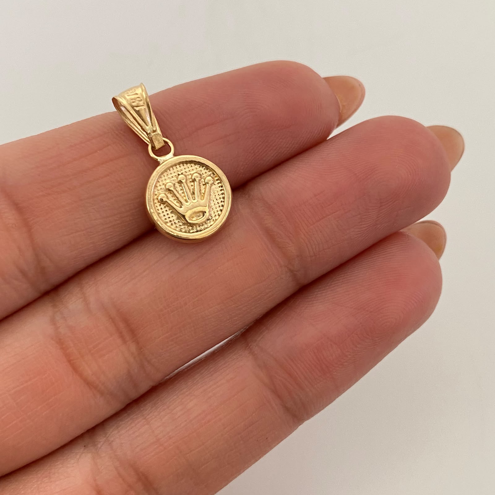 Dije Corona Rx Oro amarillo 18k 0,65 Gr / 10,2 mm / 2 Cm