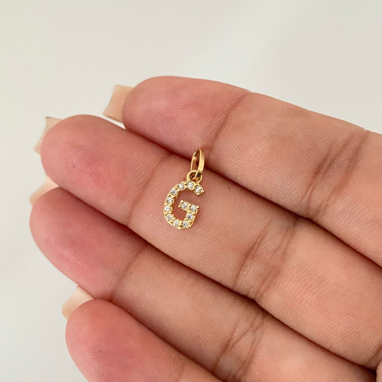 Dije letra G casting Oro amarillo 18k 0,5 Gr / 1,5 Cm