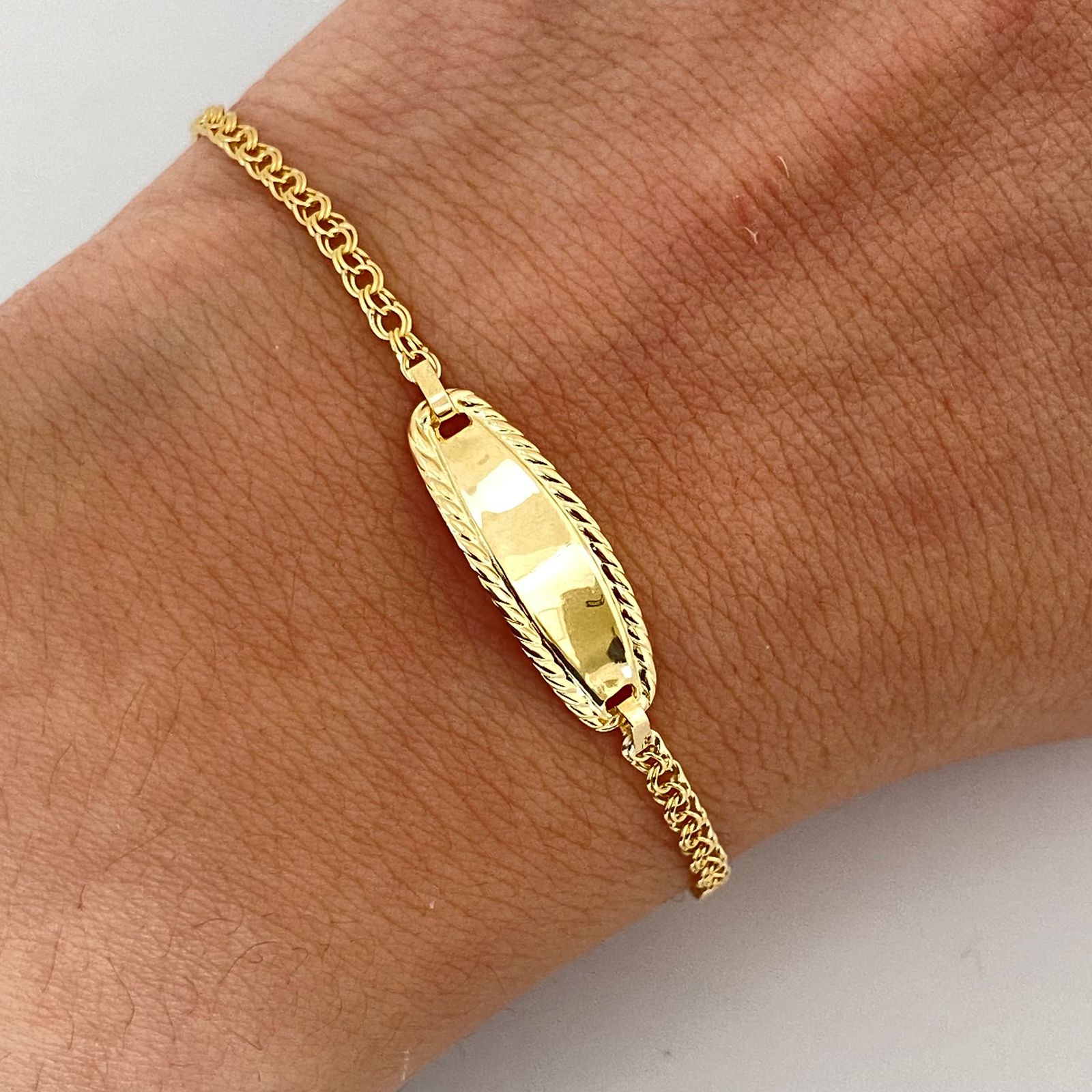 Pulso bebé con herraje borde diamantado  Oro amarillo 18k 1,40 Gr / 14 Cm  Broche 0,15