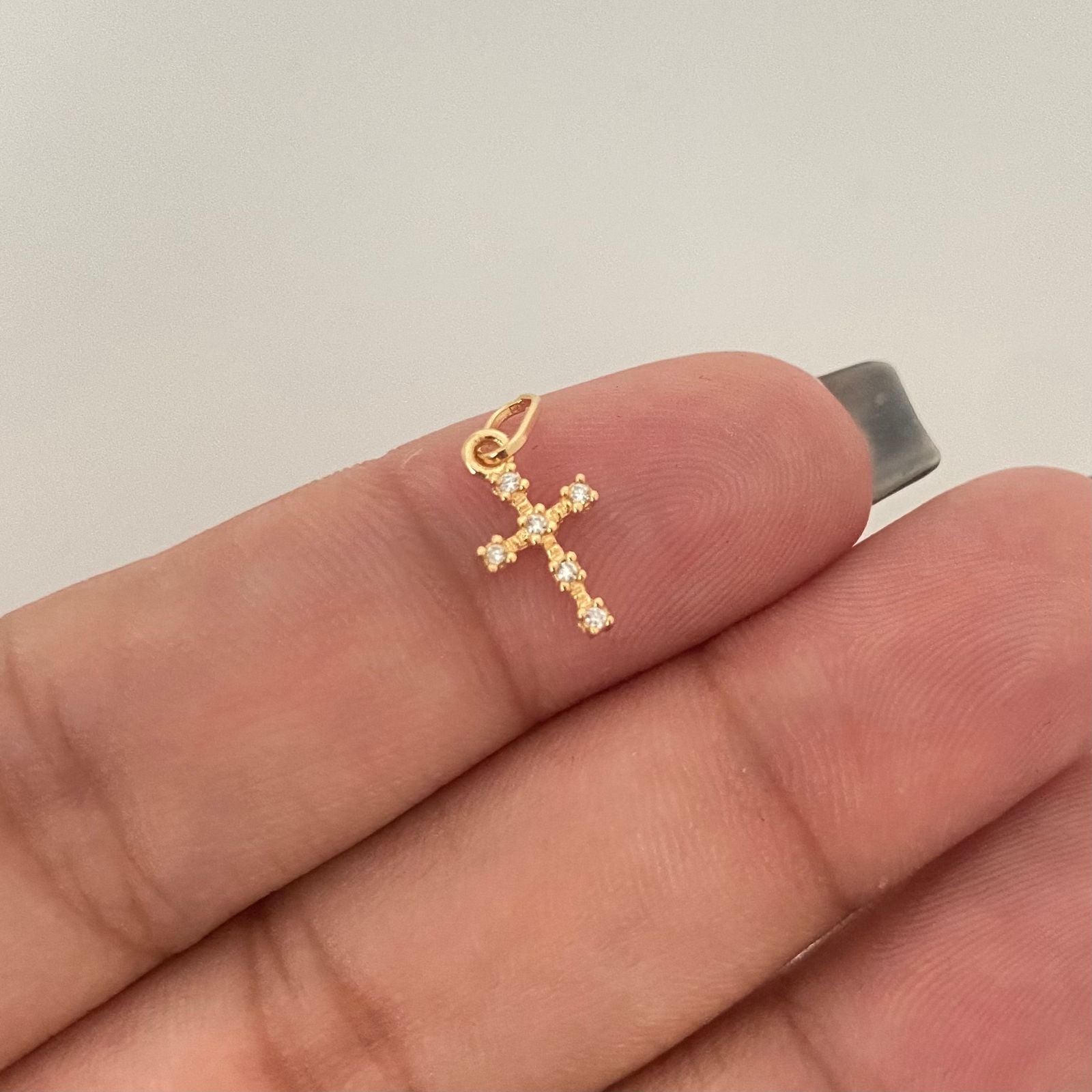 Dije mini cruz circones blancos Oro amarillo 18k 0,35 Gr / 1,5 Cm
