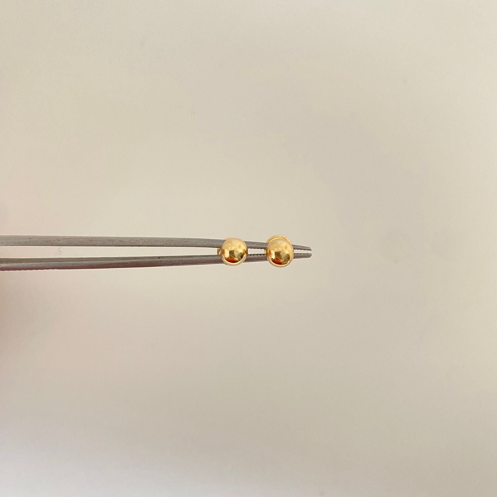 Topos   bola lisa Oro amarillo 18k 0,65 Gr / 5,0 mm