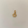 Dije Flor Casting Oro amarillo 18k 0,5 Gr / 8,9 mm / 1,6 Cm