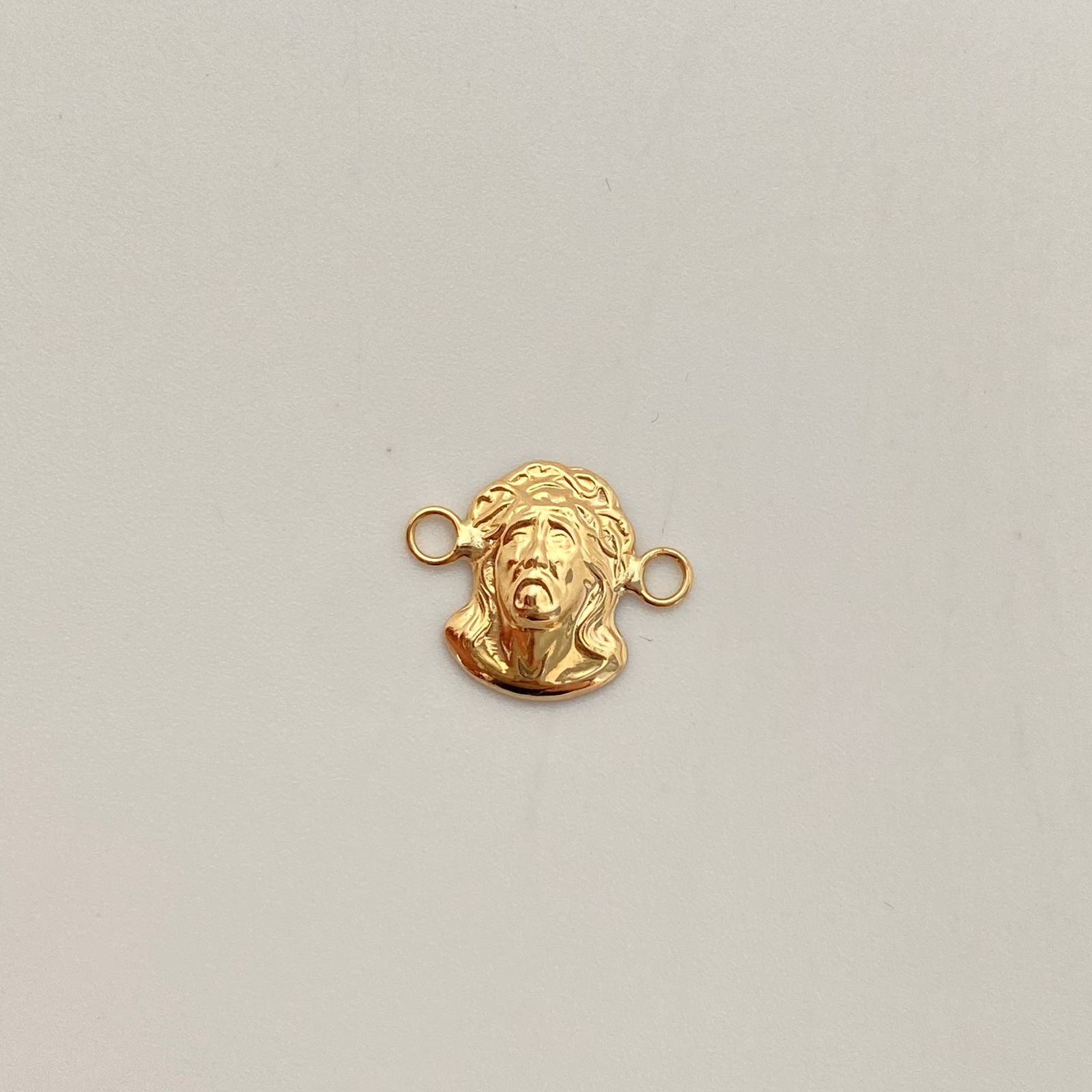 Herraje rostro de jesus  Oro amarillo 18k 0,45 Gr / 1,4 Cm