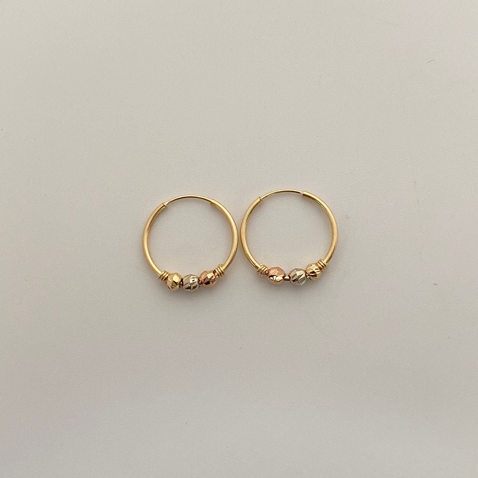Candonga imperdible bola diamantada Tres oros 18k 1,10 Gr / 1,8 Cm