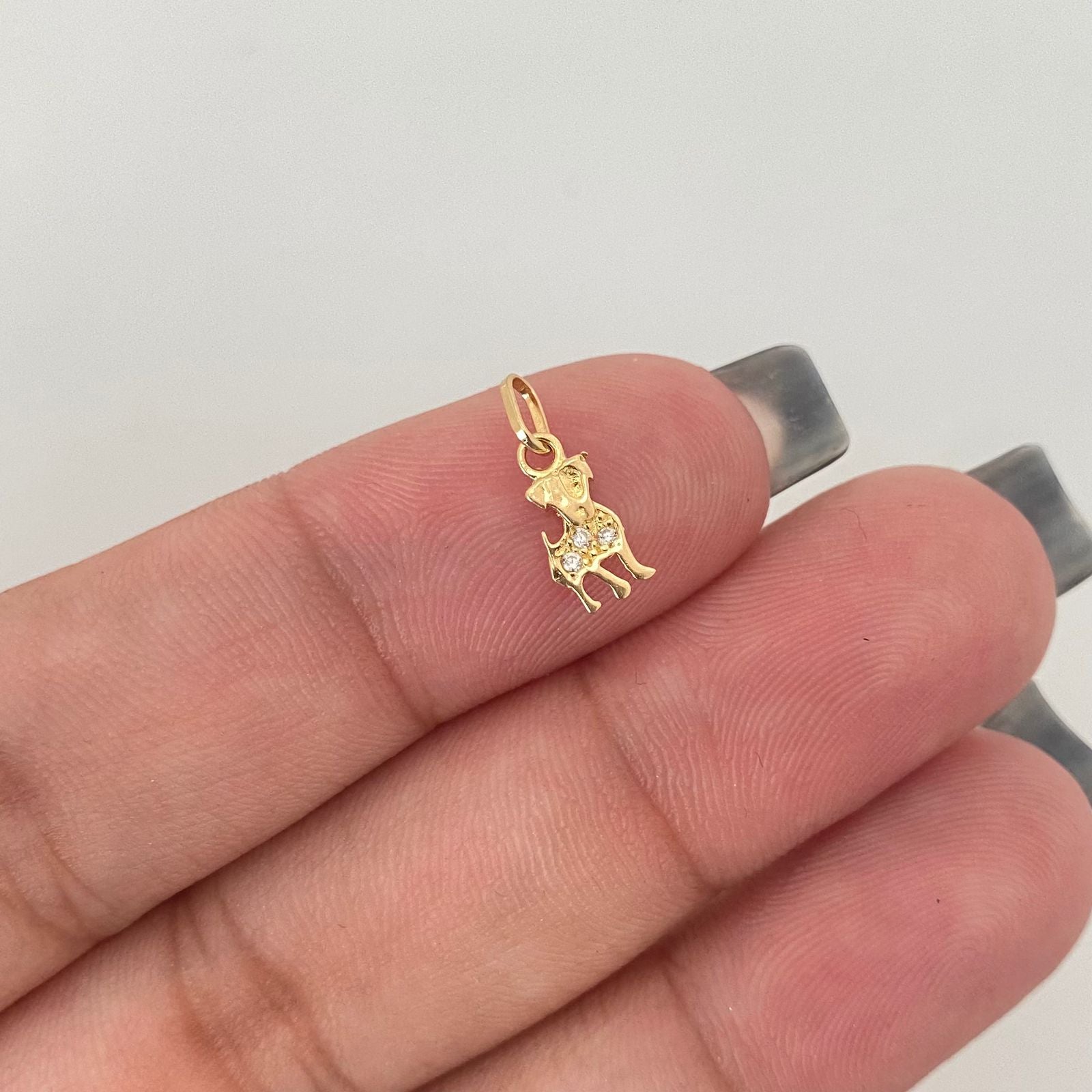 Dije mini perrito casting Oro amarillo 18k 0,40 Gr / 1,4 Cm
