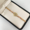 Pulsera tejida con herraje rx y bolas diamantadas 5mm y 4mm  Oro amarillo y Oro rosa 18k 4 Gr