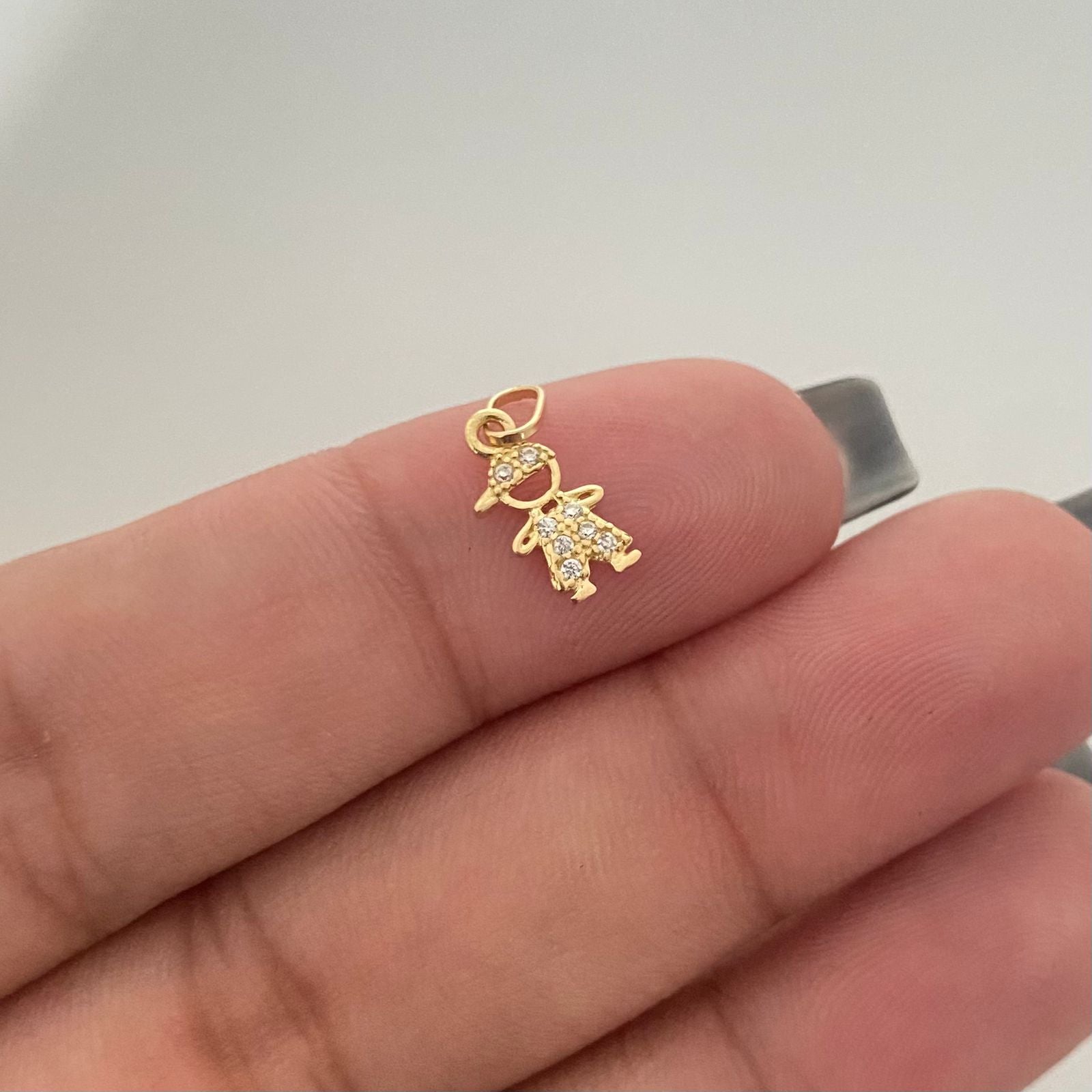 Dije niño casting Oro amarillo 18k 0,40 Gr / 1,5 Cm