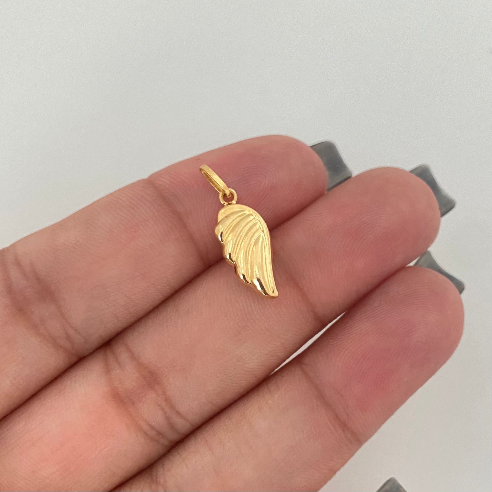 Dije ala Oro amarillo 18k 0,45 Gr / 2,0 Cm