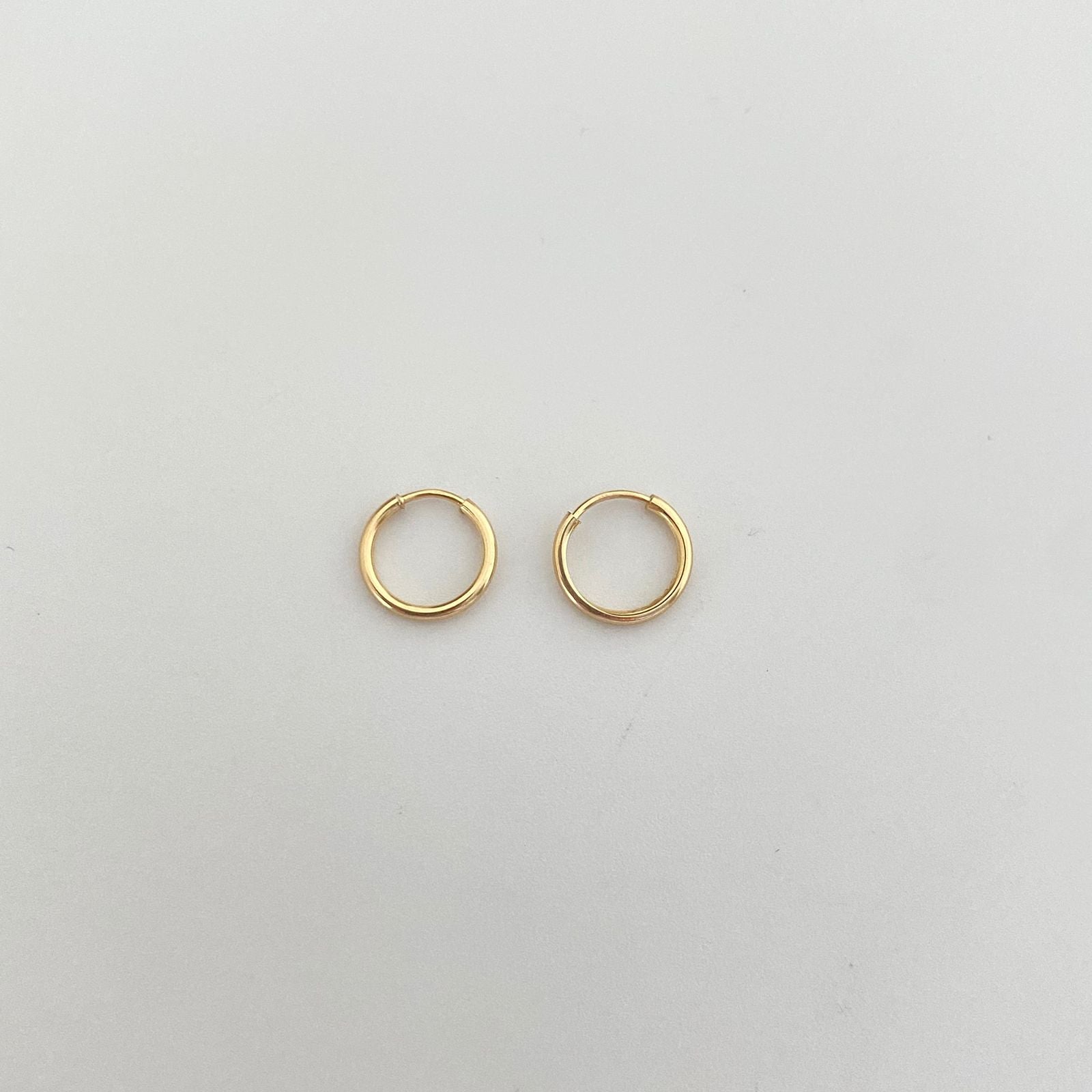 Candonga imperdible lisa Oro amarillo 18k 0,35 Gr / 0,9 Cm