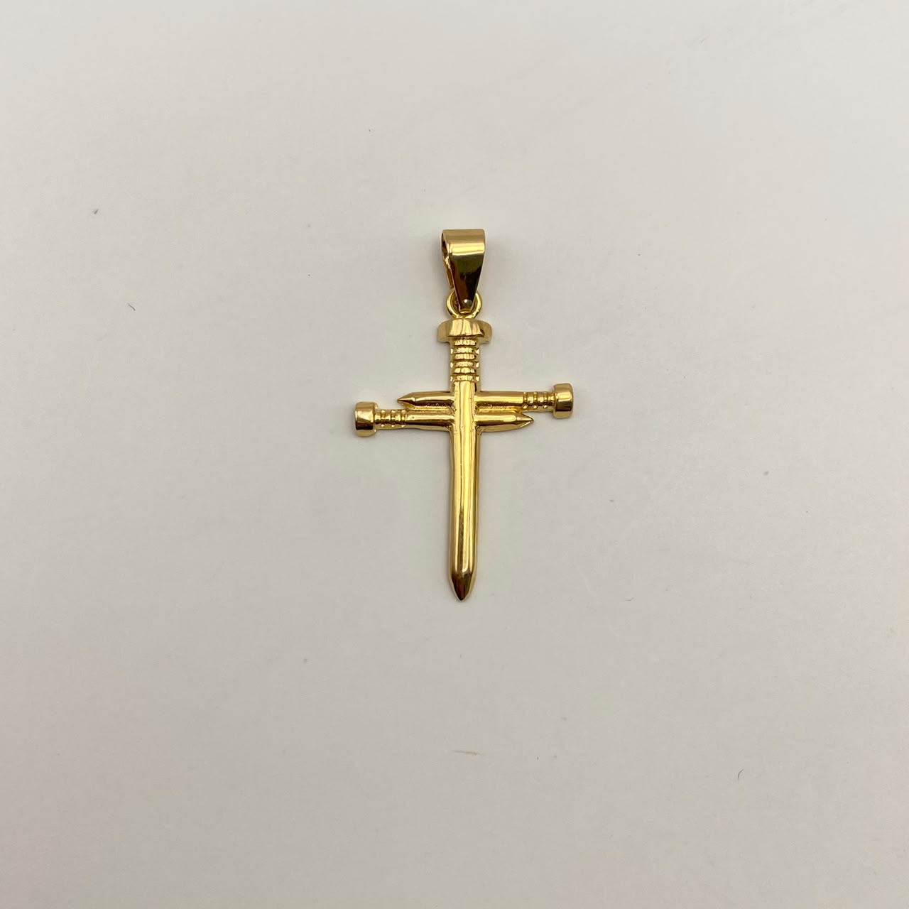 Dije Cruz clavo Oro amarillo 18k 1,65 Gr / 2,4 mm / 3,6 Cm