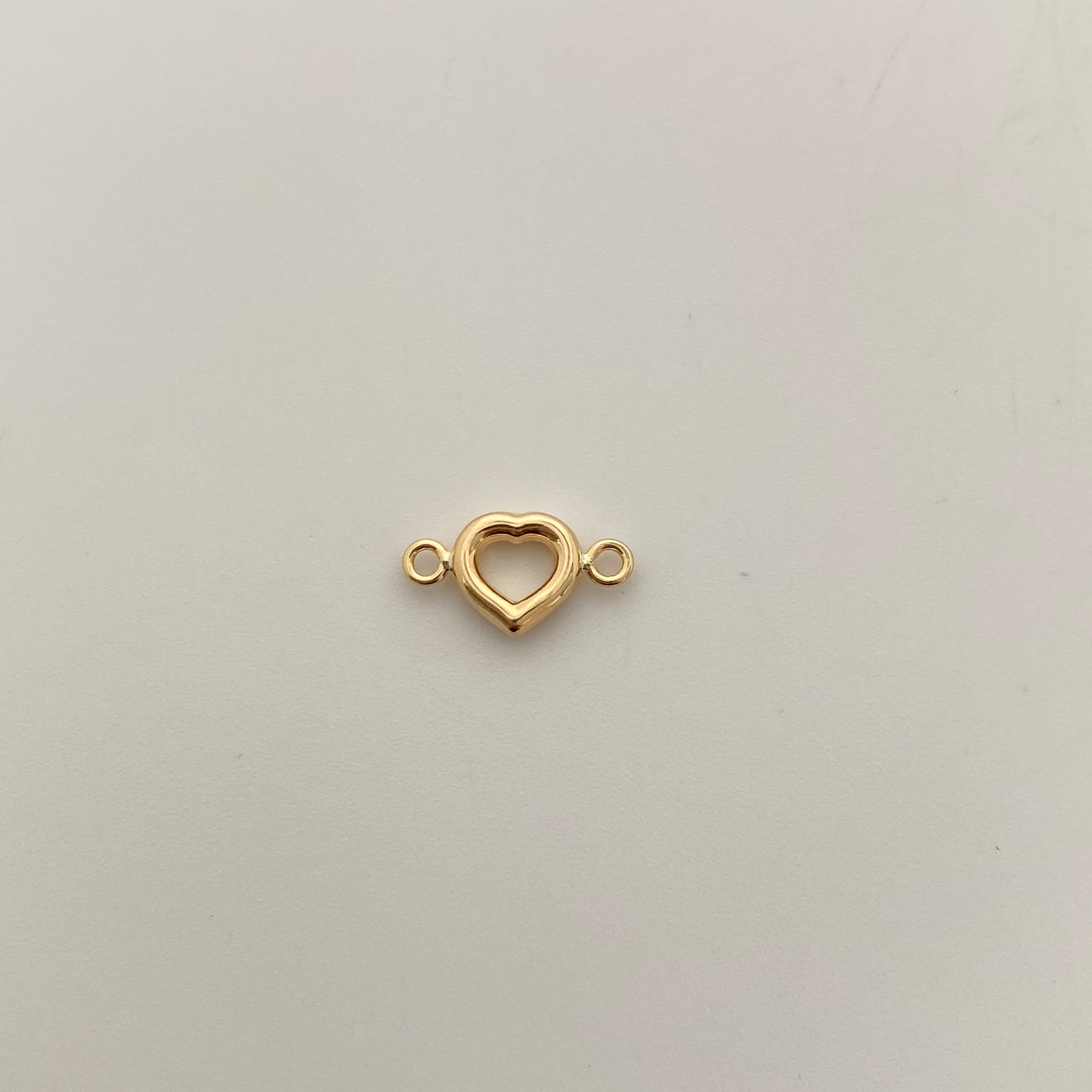 Herraje Corazon Silueta Oro amarillo 18k 0,4 Gr / 1,5 Cm