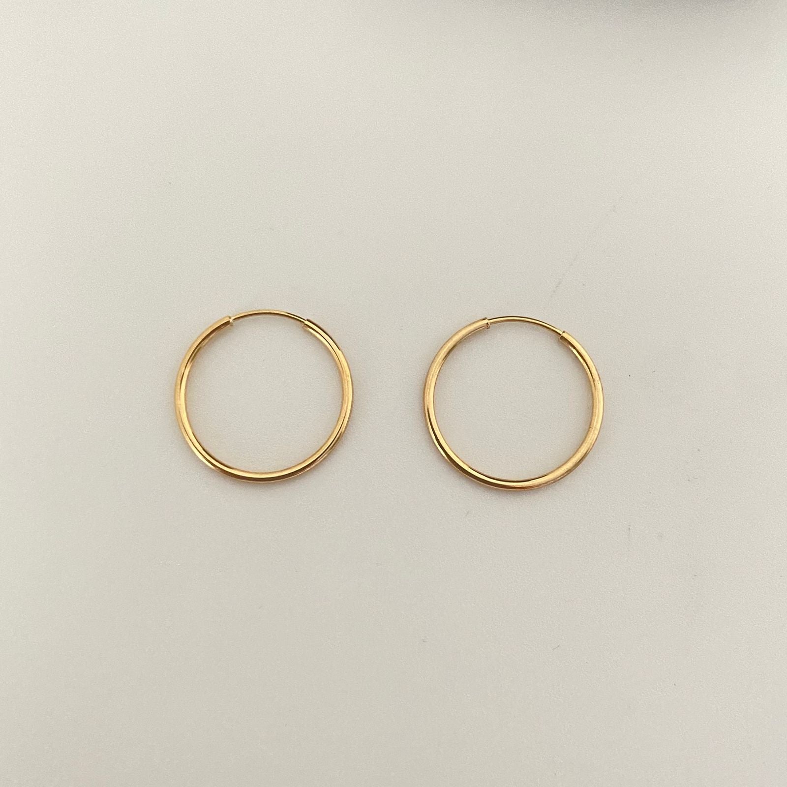 Candonga imperdible lisa Oro amarillo 18k 0,75 Gr / 2,5 Cm