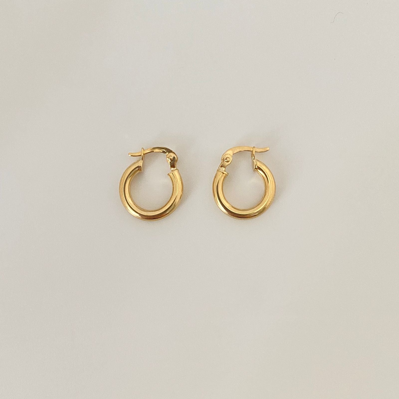 Candonga redonda lisa Oro amarillo 18k 1,2 Gr / 1,4 Cm