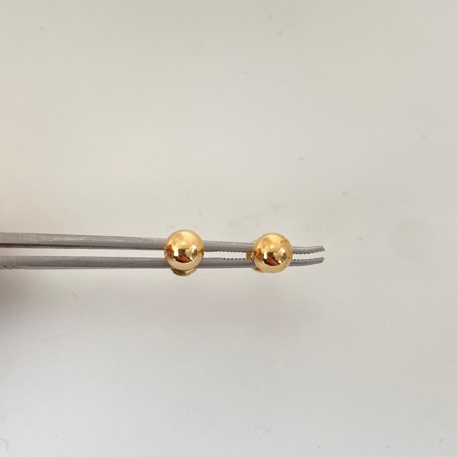 Topos bola lisa Oro amarillo 18k 0,60 Gr / 6,0 mm