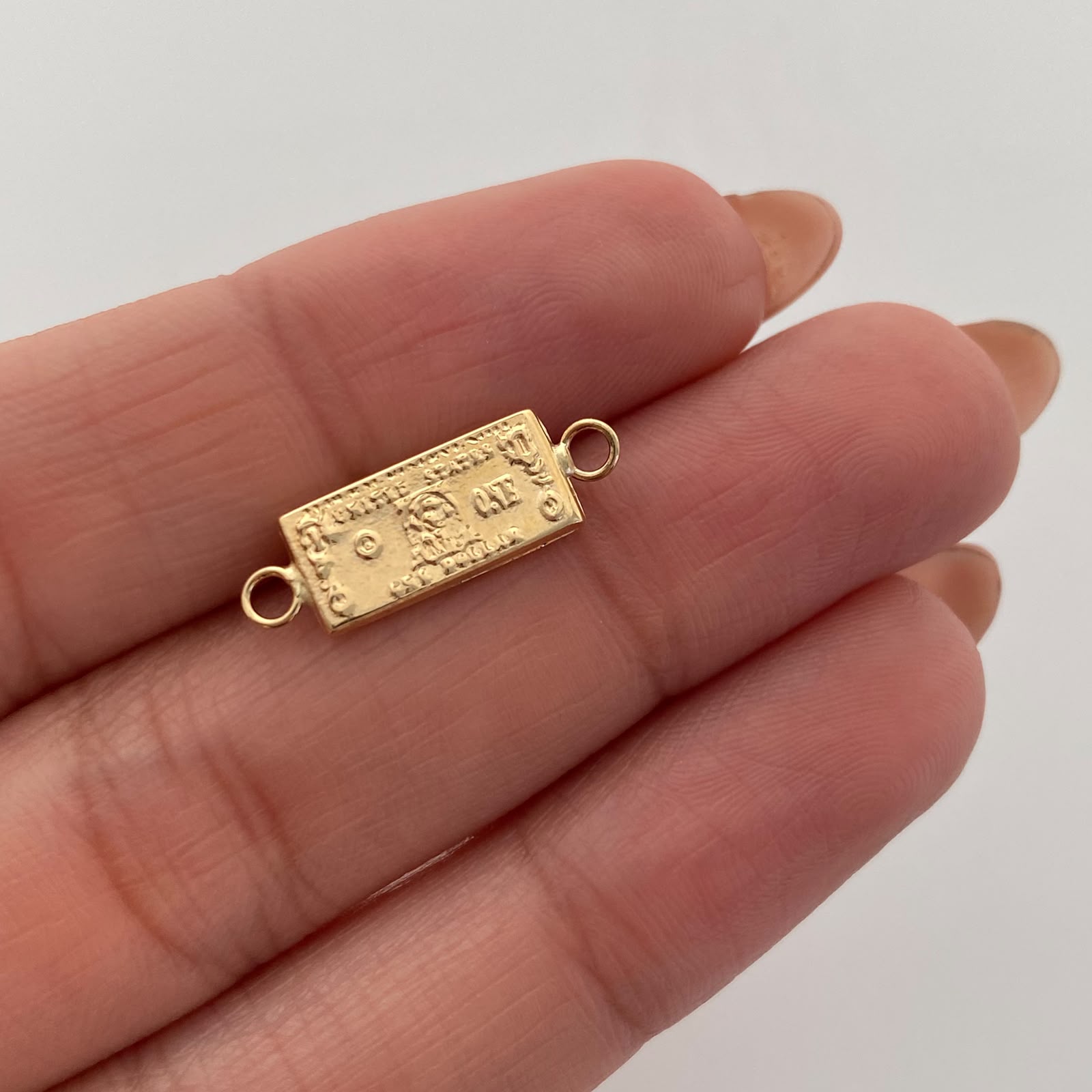 Herraje Dolar Oro amarillo 18k 0,6 Gr / 2 Cm