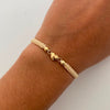 Pulsera tejida Corazon Inflado Bolas 4mm lisas beige Oro amarillo 18k 0,5 Gr