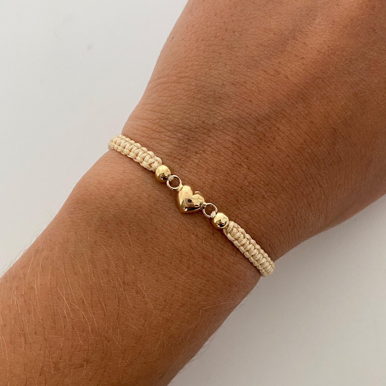 Pulsera tejida Corazon Inflado Bolas 4mm lisas beige Oro amarillo 18k 0,5 Gr