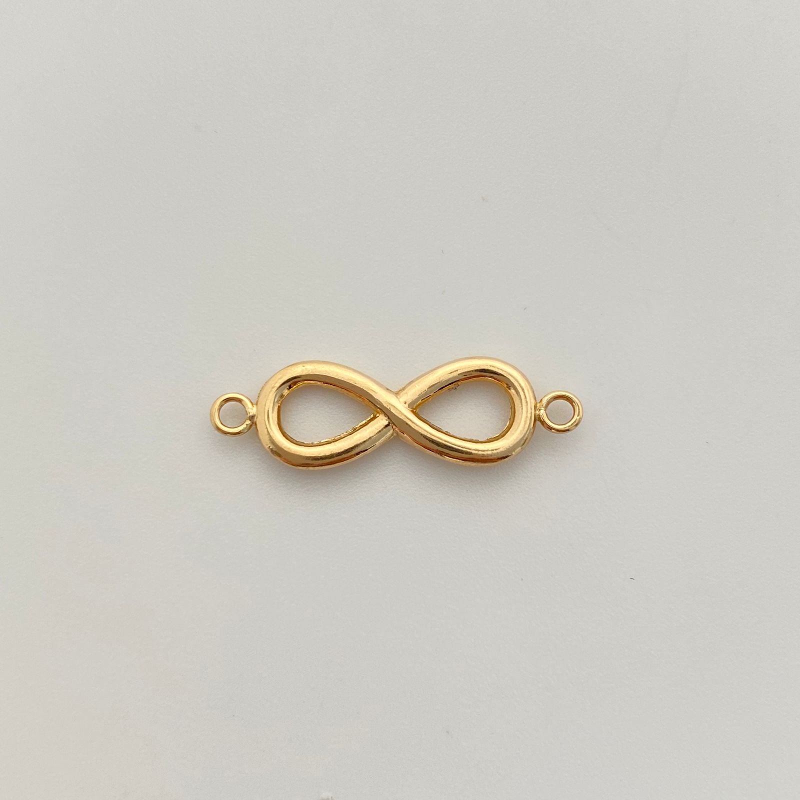 Herraje infinito  Oro amarillo 18k 0,95 Gr / 2,7 Cm