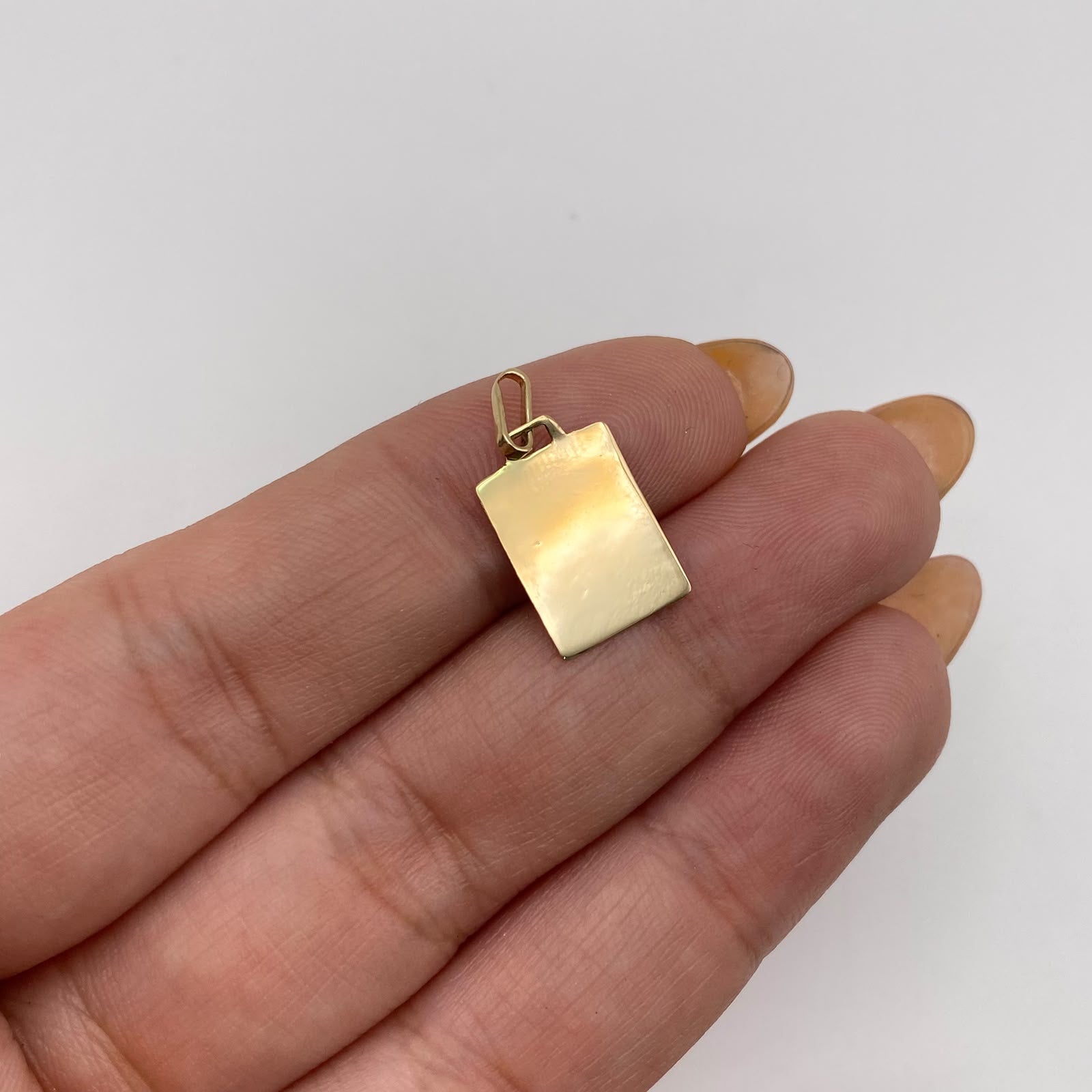 Dije Placa lisa Oro amarillo 18k 0,65 Gr / 9,9 mm / 2 Cm