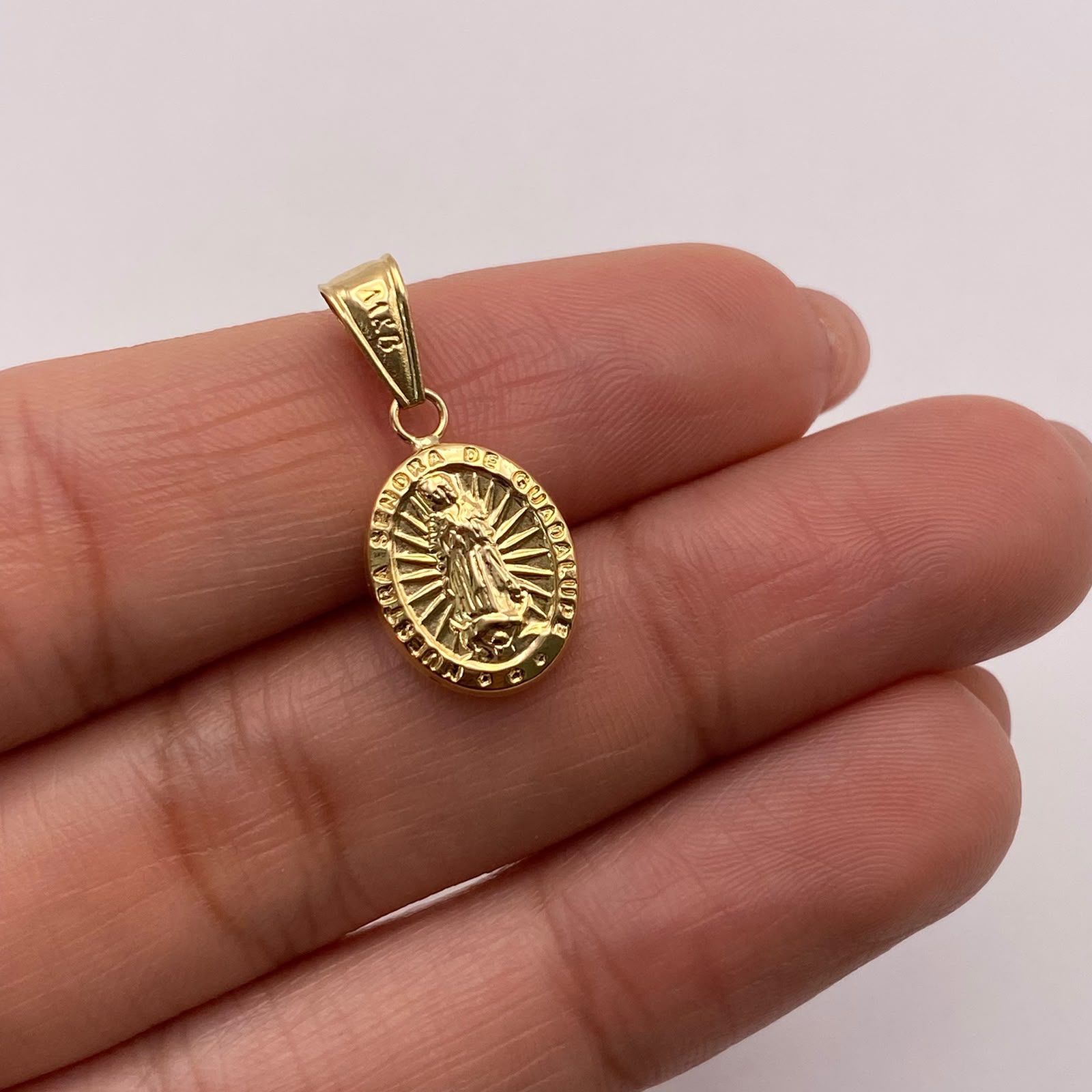 Dije Virgen de guadalupe Oro amarillo 18k 0,81 Gr / 10,4 mm / 2,1 Cm