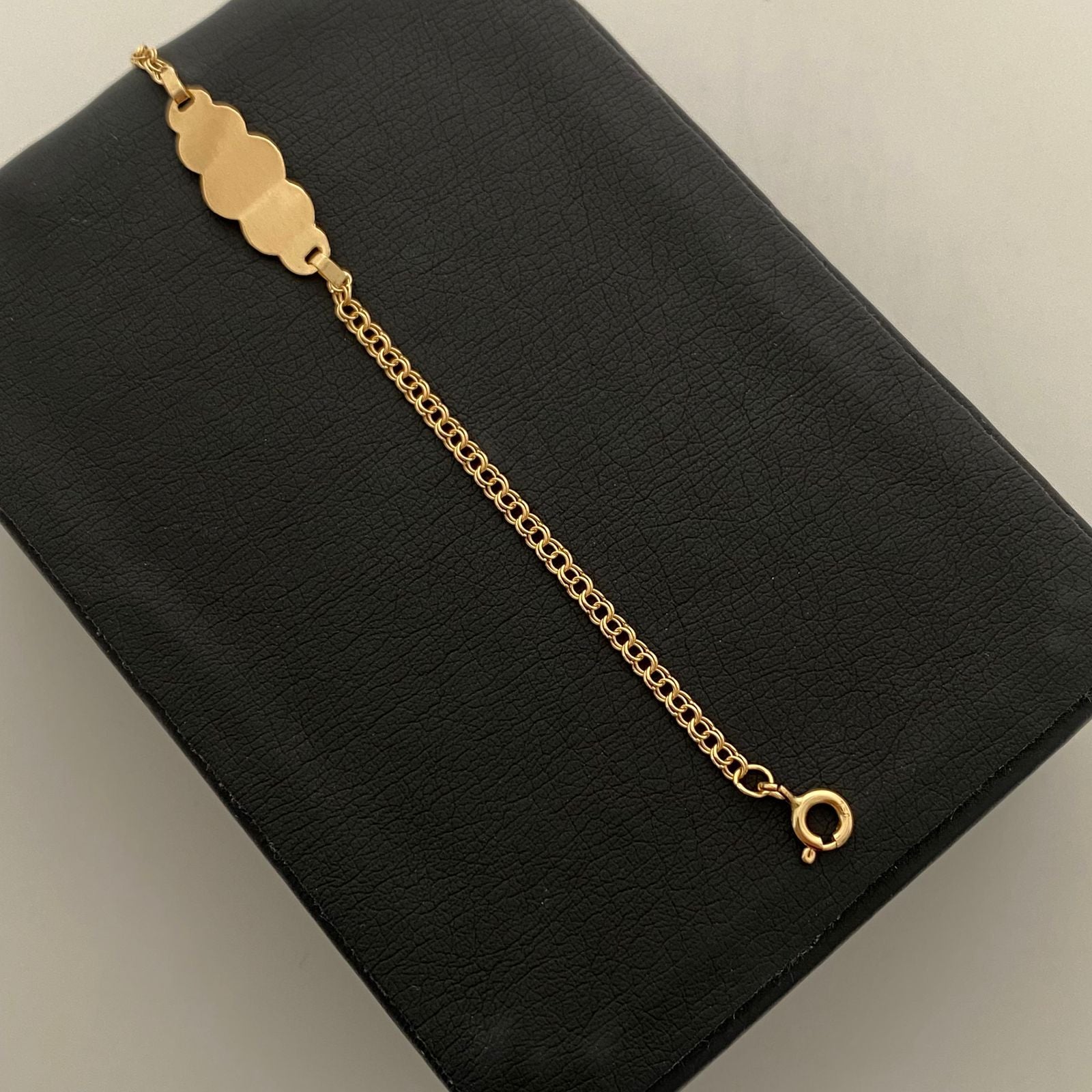 Pulso bebé con herraje  placa nuba  Oro amarillo 18k 1,40 Gr / 2,2 mm / 15,5 Cm Broche 0,20