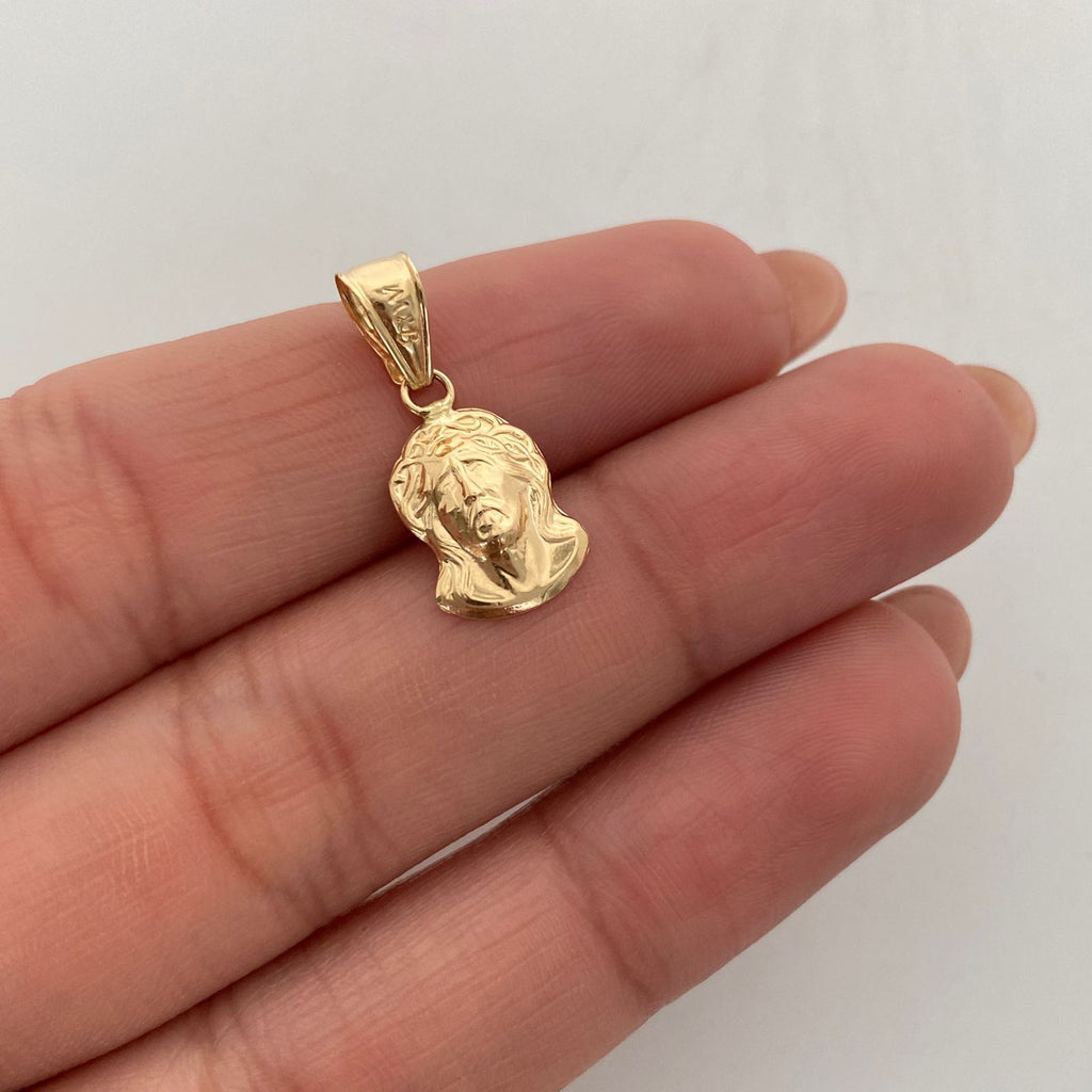 Dije Rostro Oro amarillo 18k 0,65 Gr / 9,4 mm / 2 Cm