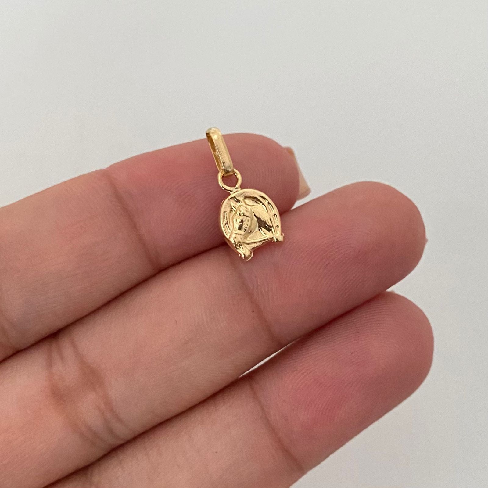Dije herradura caballo Oro amarillo 18k 0,50 Gr / 1,5 Cm