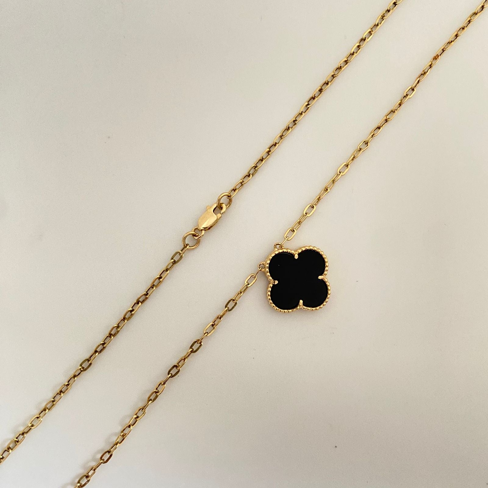 Cadena trebol fondo negro  Oro amarillo 18k +1 / 4,85 Gr / 14,5 mm / 50 Cm Broche 0,30