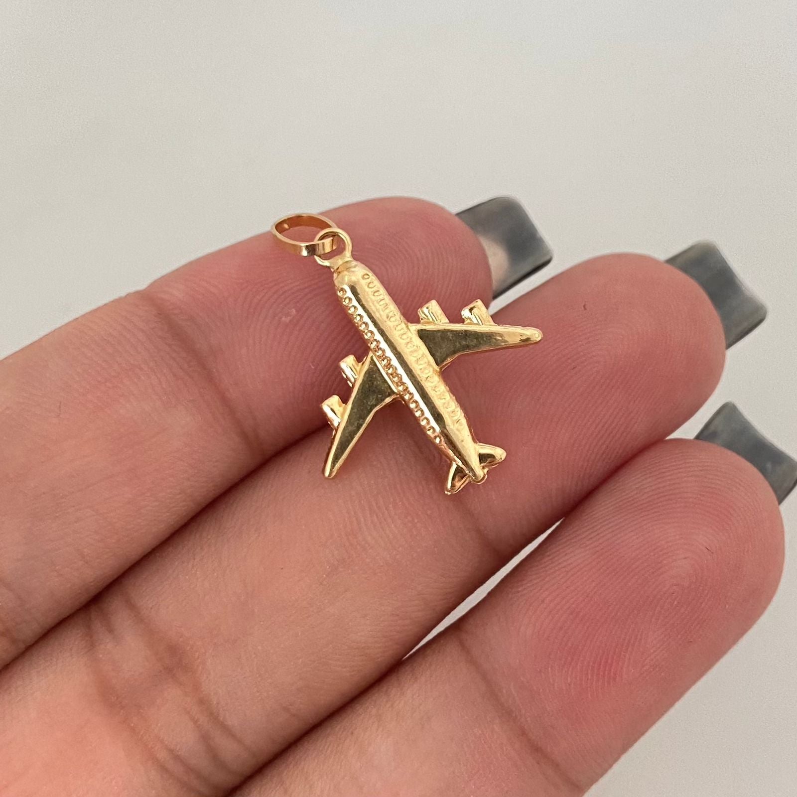 Dije avión Oro amarillo 18k 0,8 Gr / 2,5 Cm