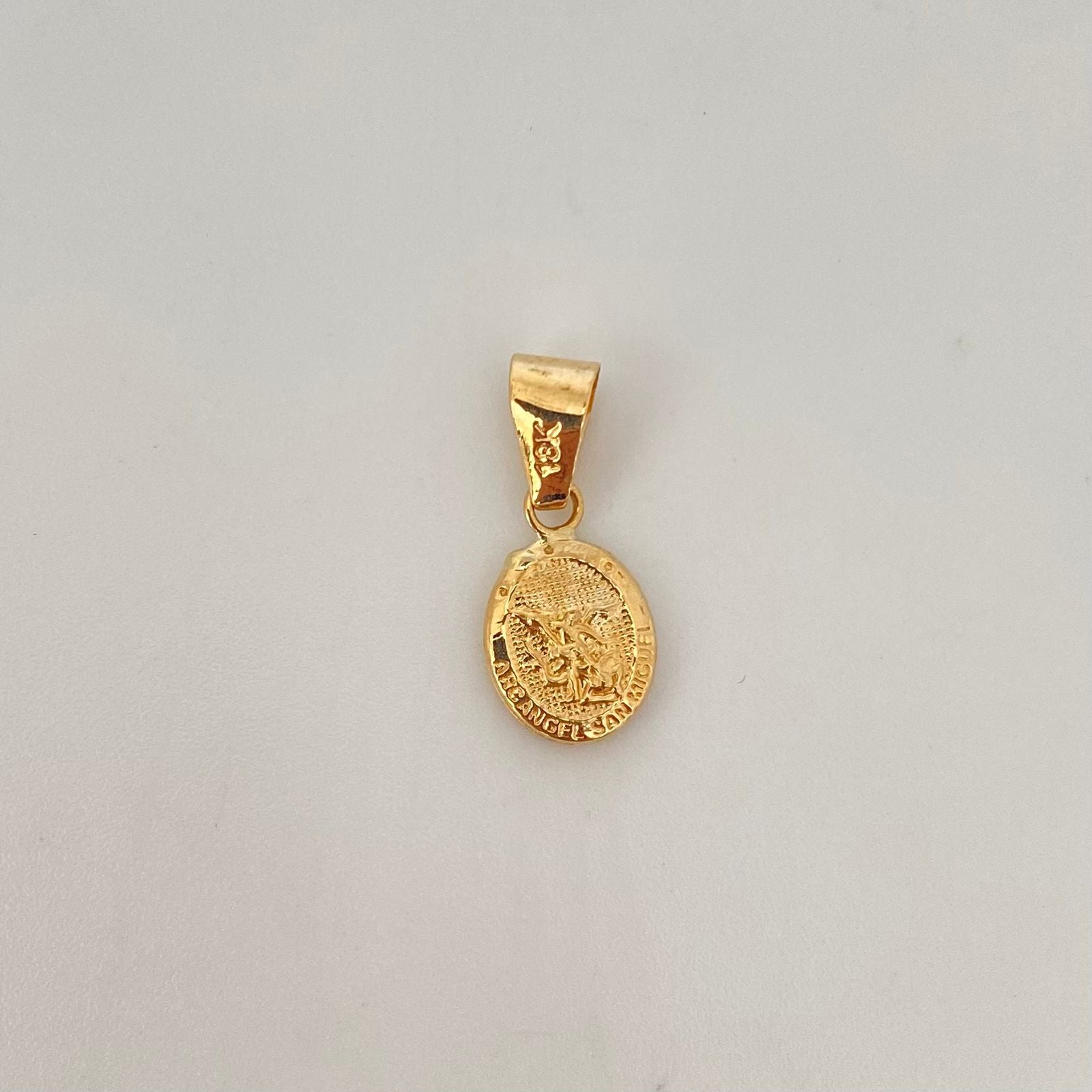 Dije arcangel san miguel  Oro amarillo 18k 0,6 Gr / 2 Cm