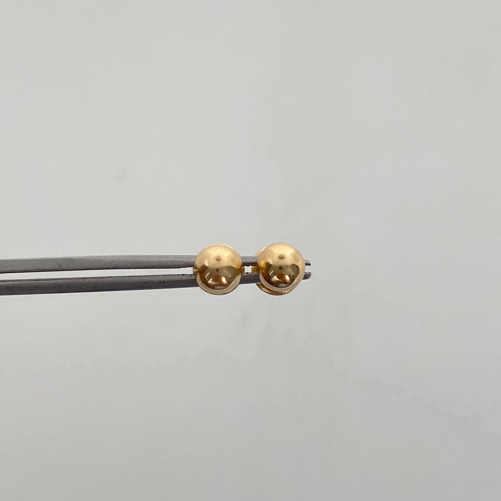 Topos Bola Lisa 5mm Oro amarillo 18k 0,55 Gr