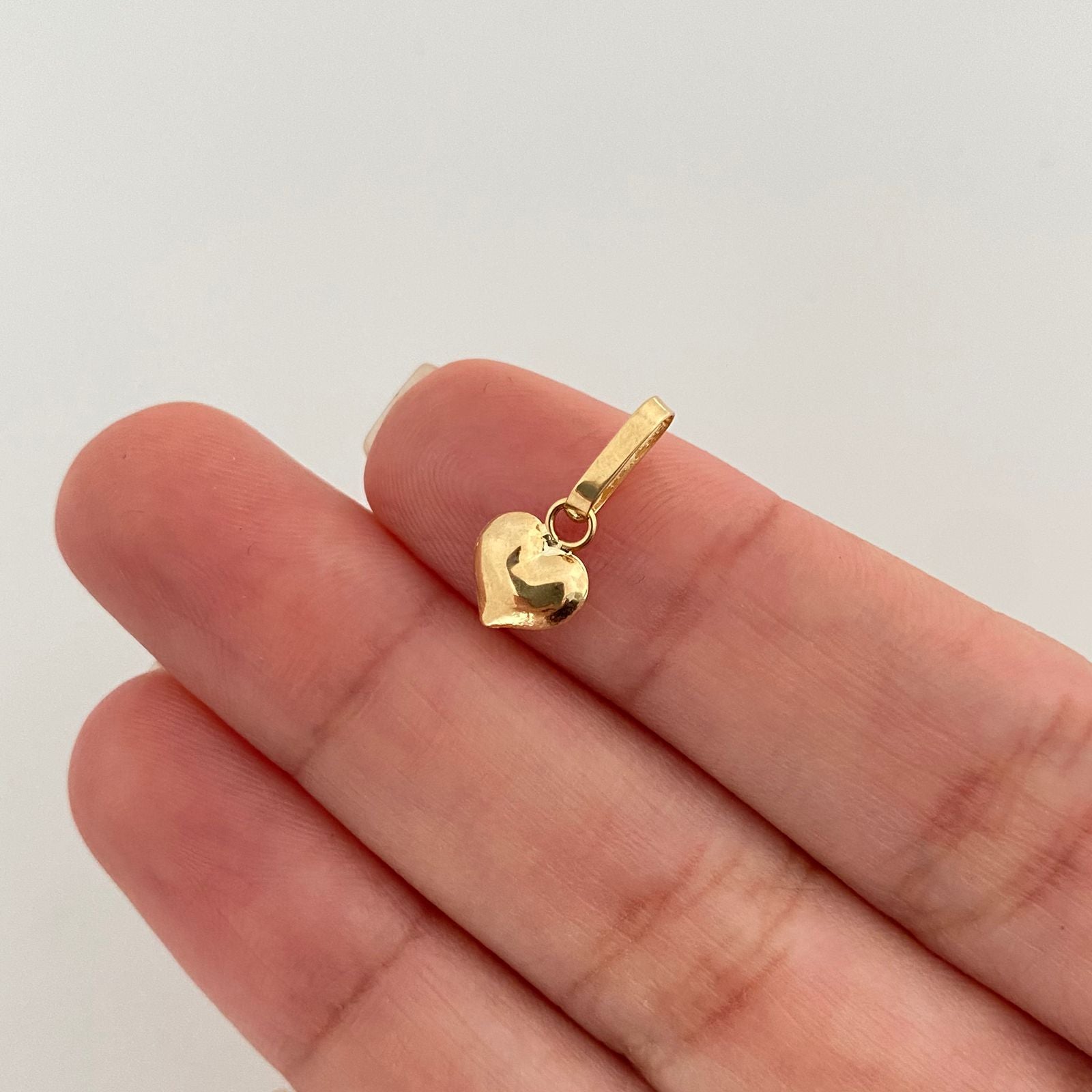 Dije corazón mini inflado Oro amarillo 18k 0,30 Gr / 1,4 Cm