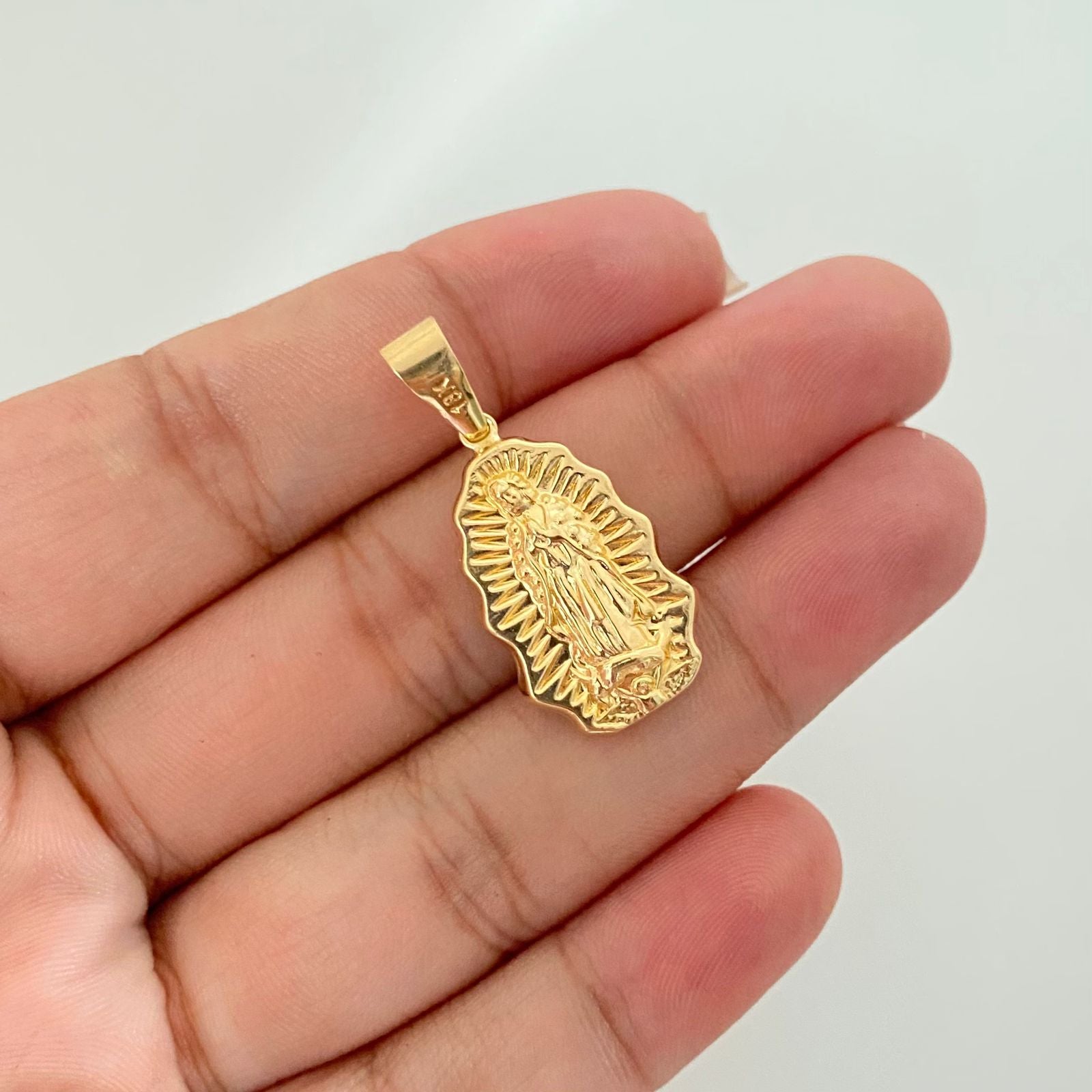 Dije silueta virgen guadalupe Oro amarillo 18k 1,75 Gr / 3,5 Cm