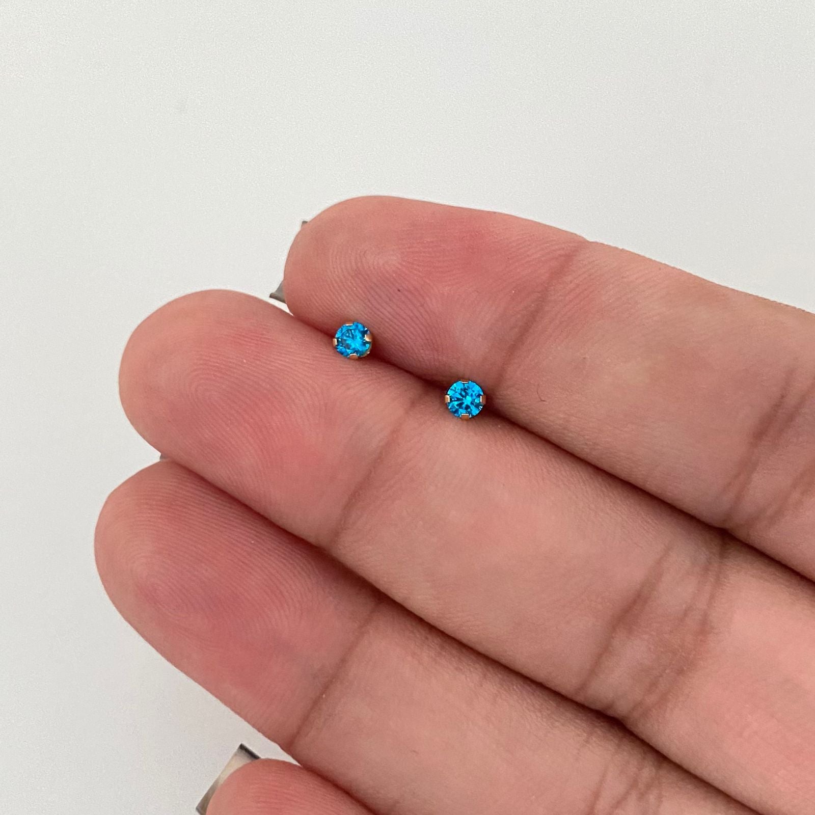 Topos circon turquesa (Joya) Oro amarillo 18k 0,50 Gr / 3,0 mm