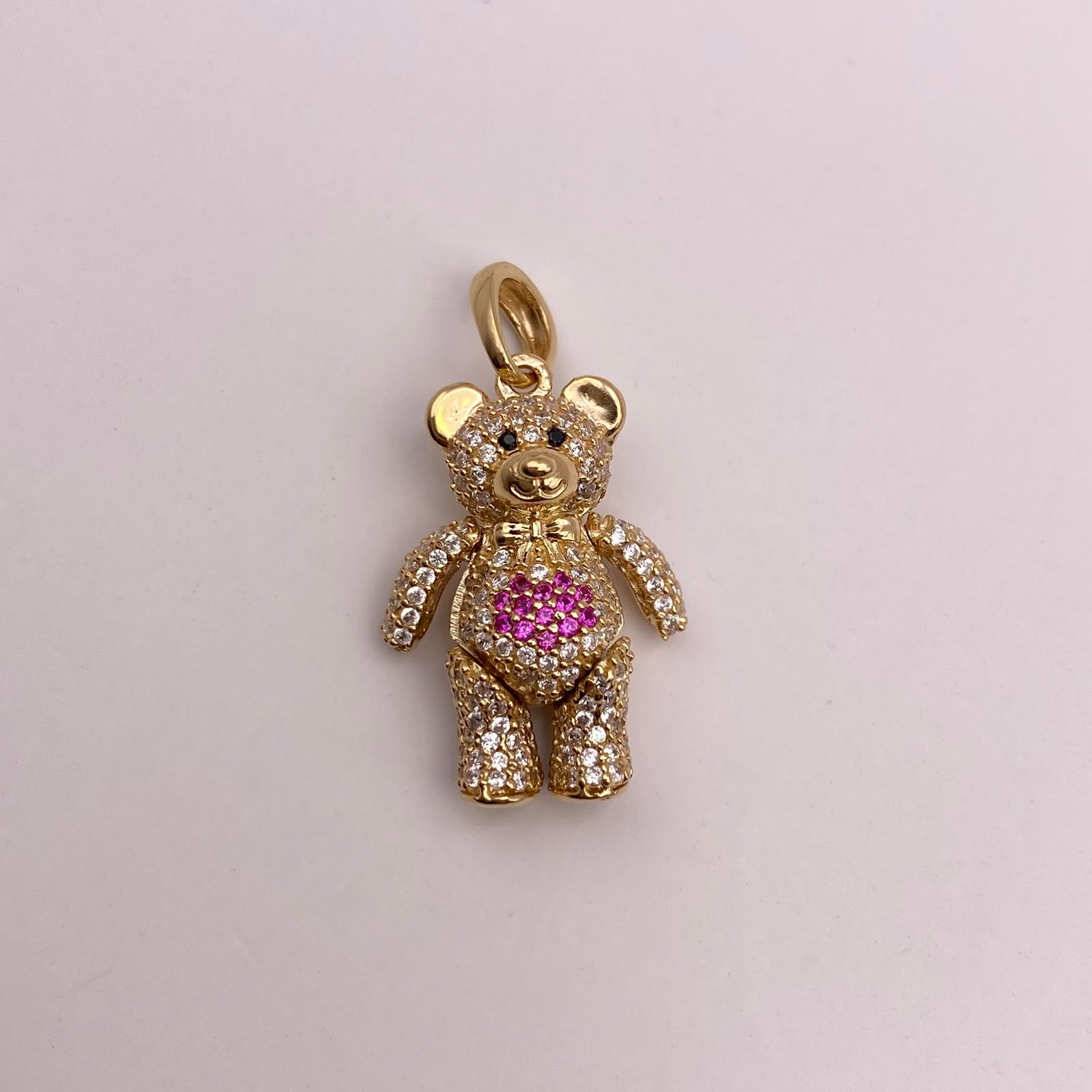 Dije Oso articulado circones blancos corazon fucsia Oro amarillo 18k 5,81 Gr / 14,9 mm / 2,9 Cm