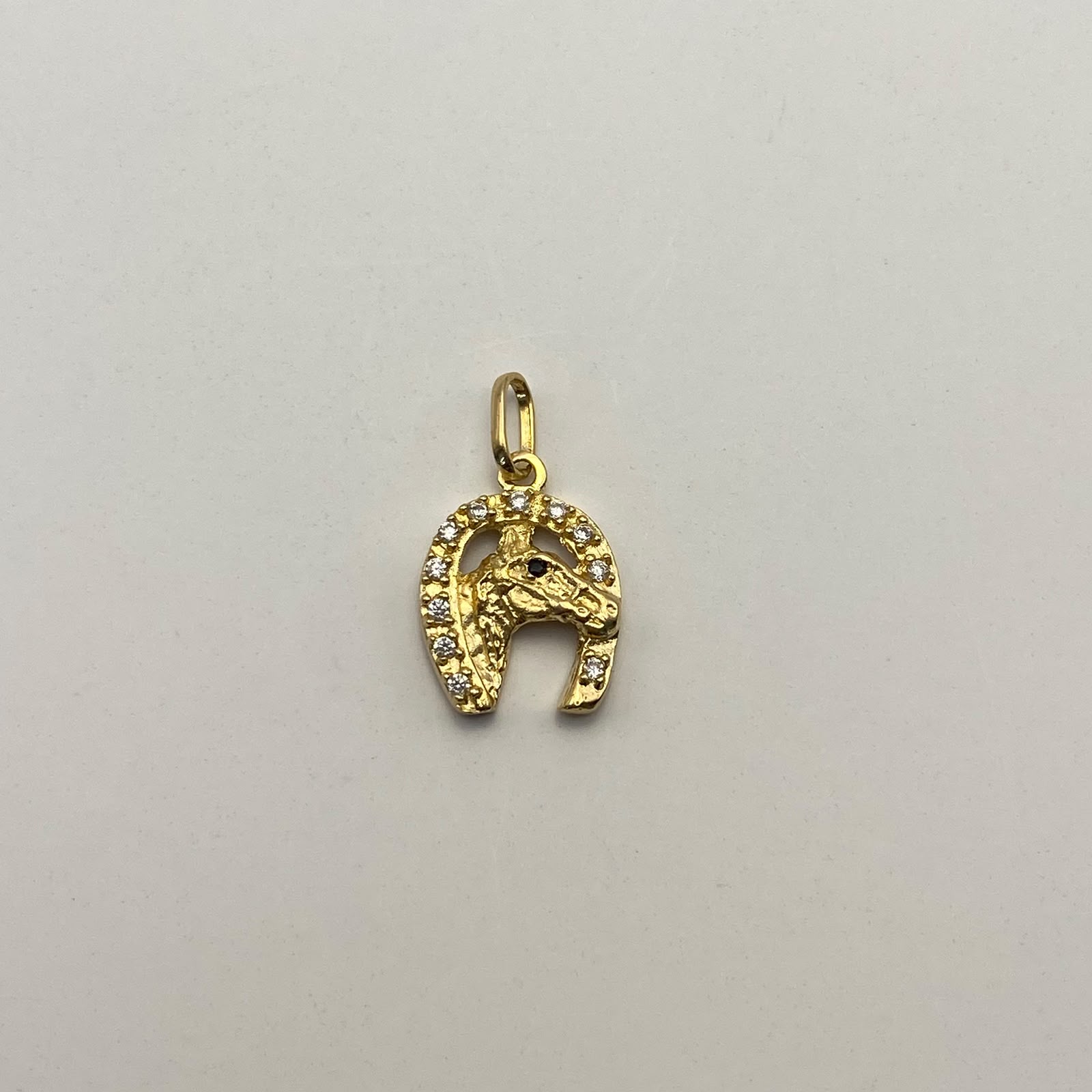 Dije Herradura y caballo Casting Blanco Oro amarillo 18k 1,85 Gr / 11,7 mm / 2 Cm