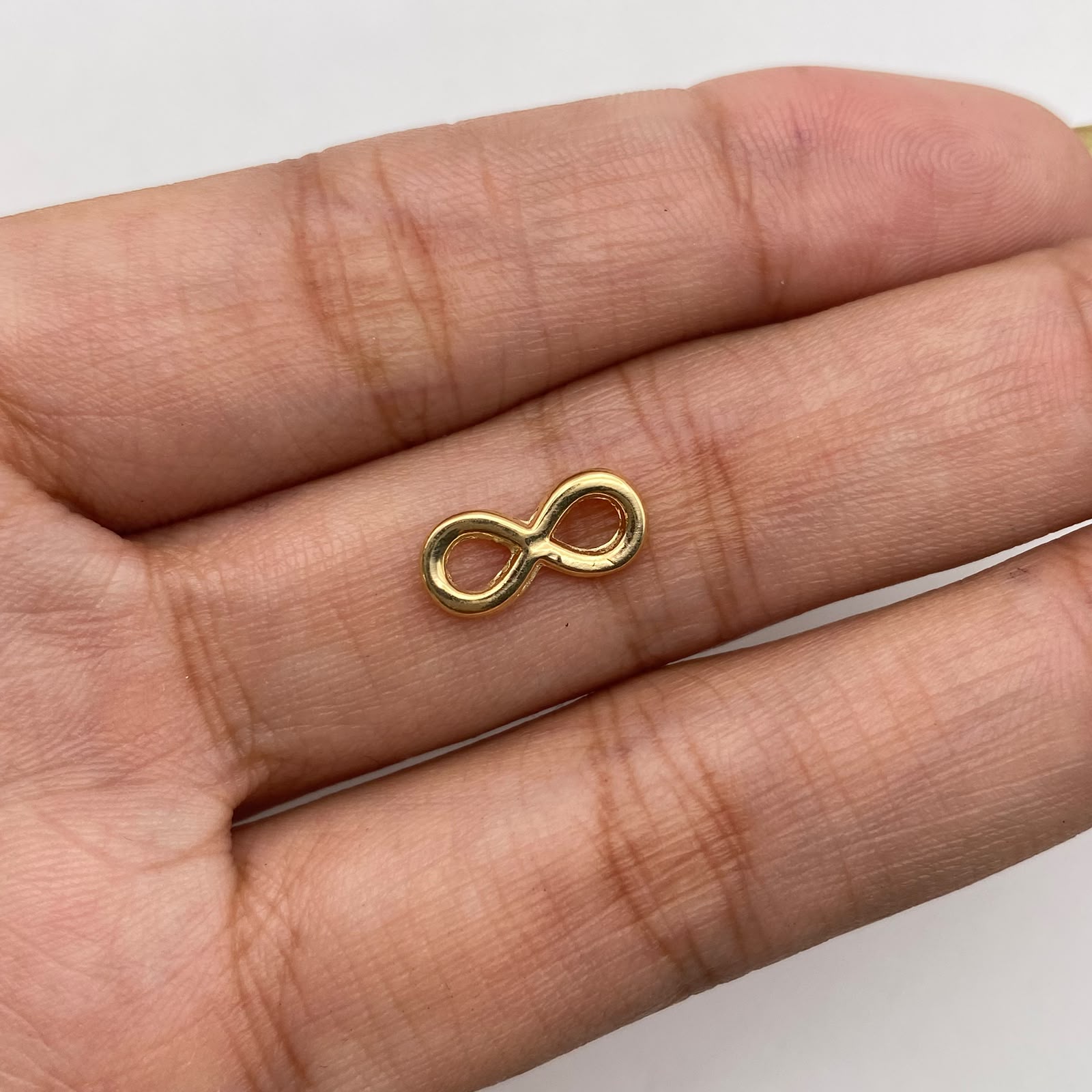 Herraje infinito Oro amarillo 18k 0,3 Gr / 1,3 Cm