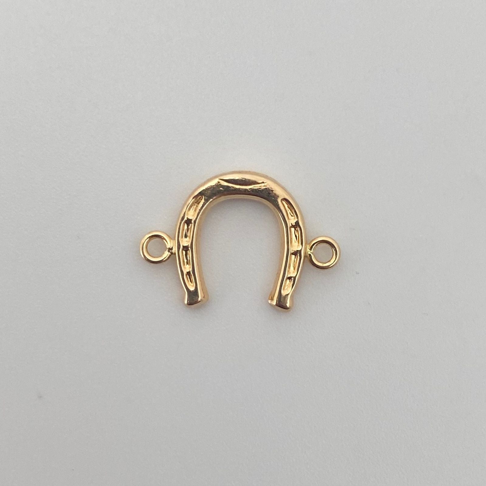 Herraje herradura Oro amarillo 18k 0,65 Gr / 1,7 Cm