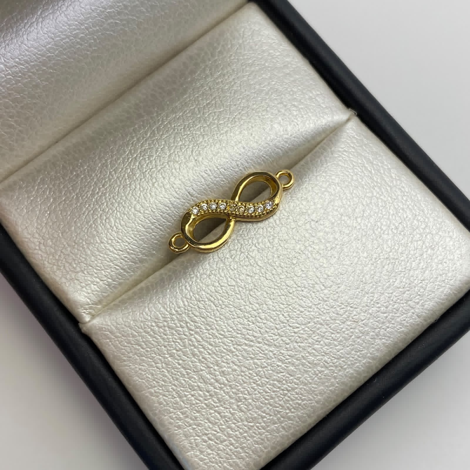 Herraje Infinito casting Oro amarillo 18k 1,15 Gr / 2,3 Cm