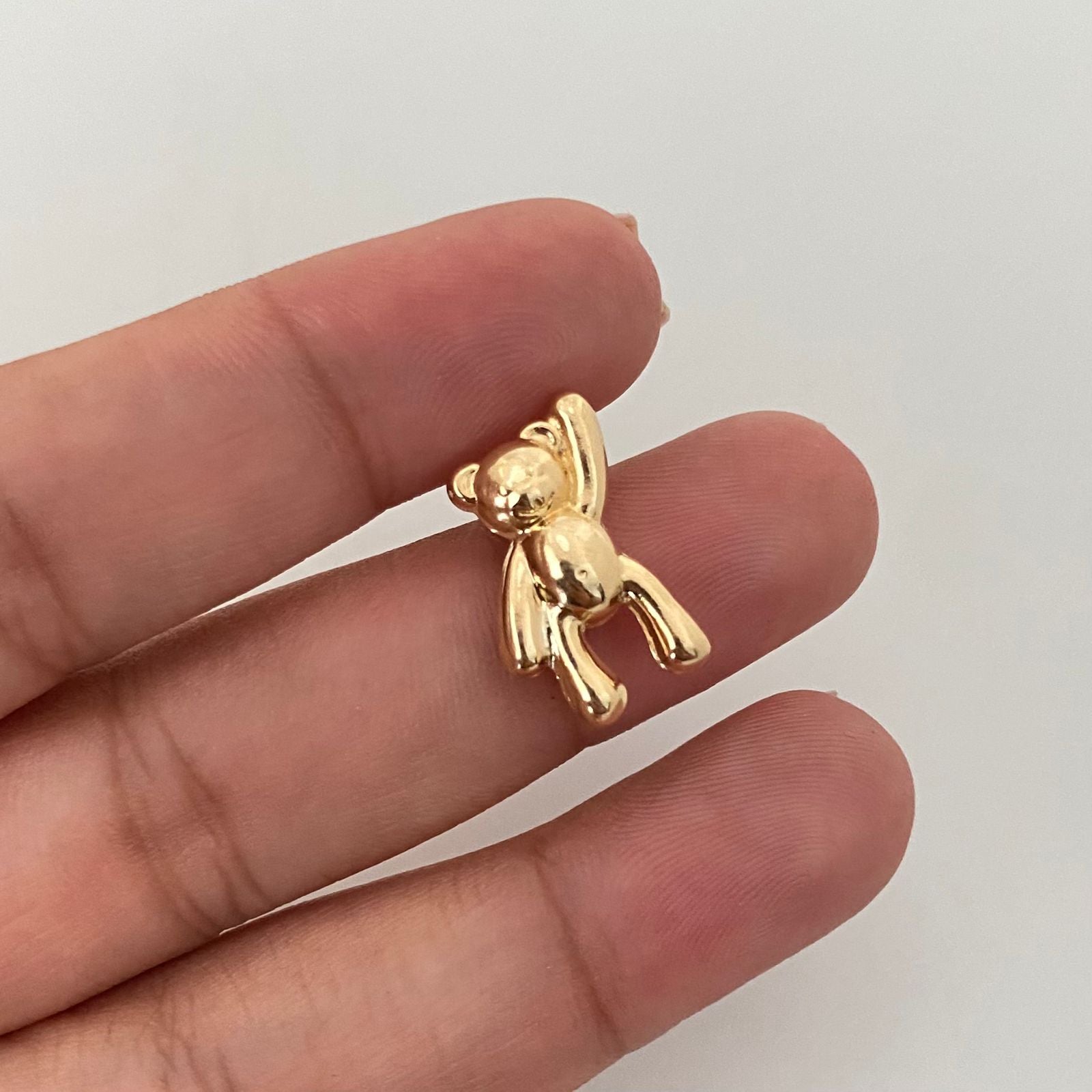 Dije oso mano alzada Oro amarillo 18k 1,35 Gr / 1,5 Cm
